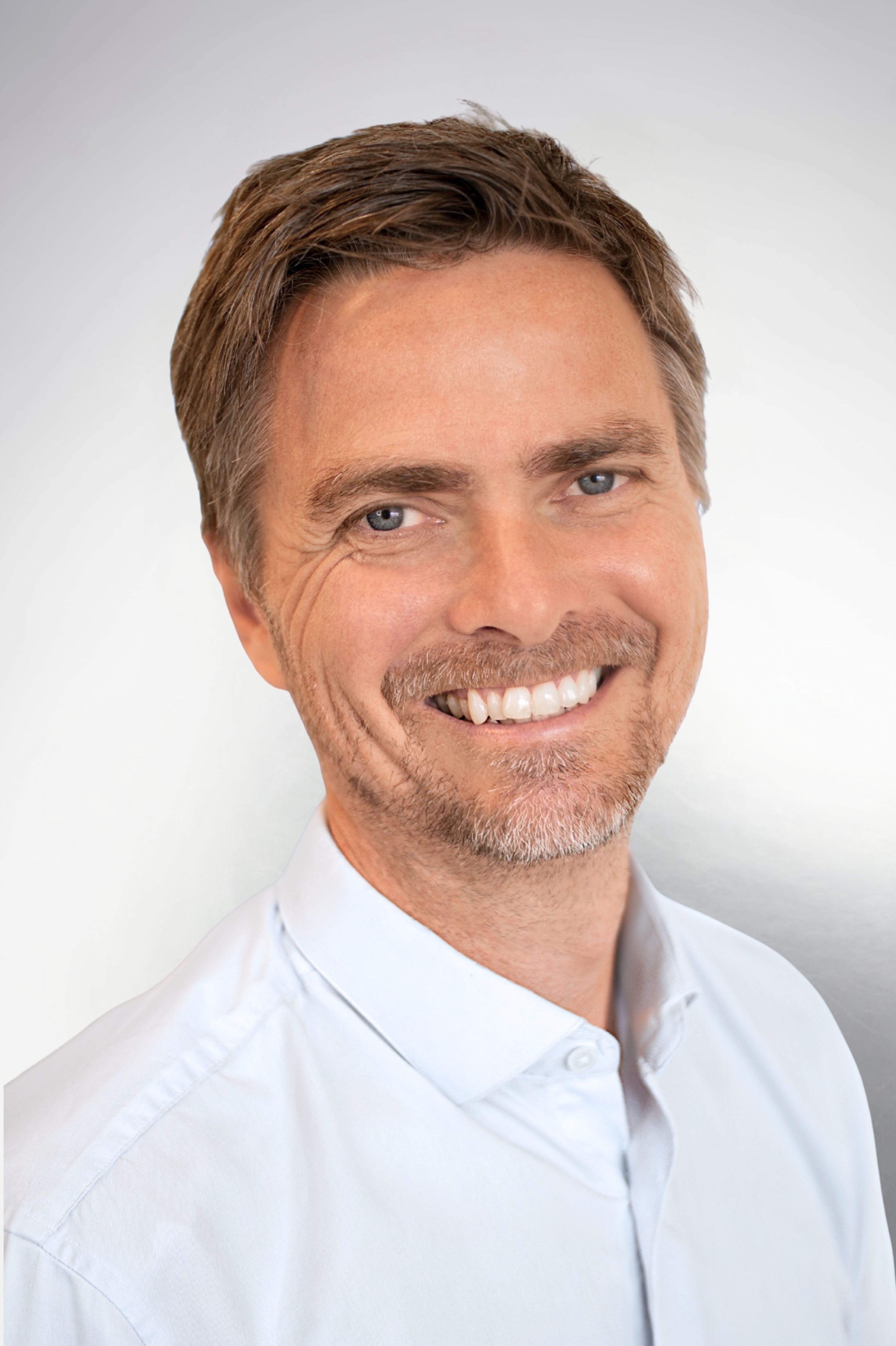 Portrait of Håkon Holmen, COO at AXTech.