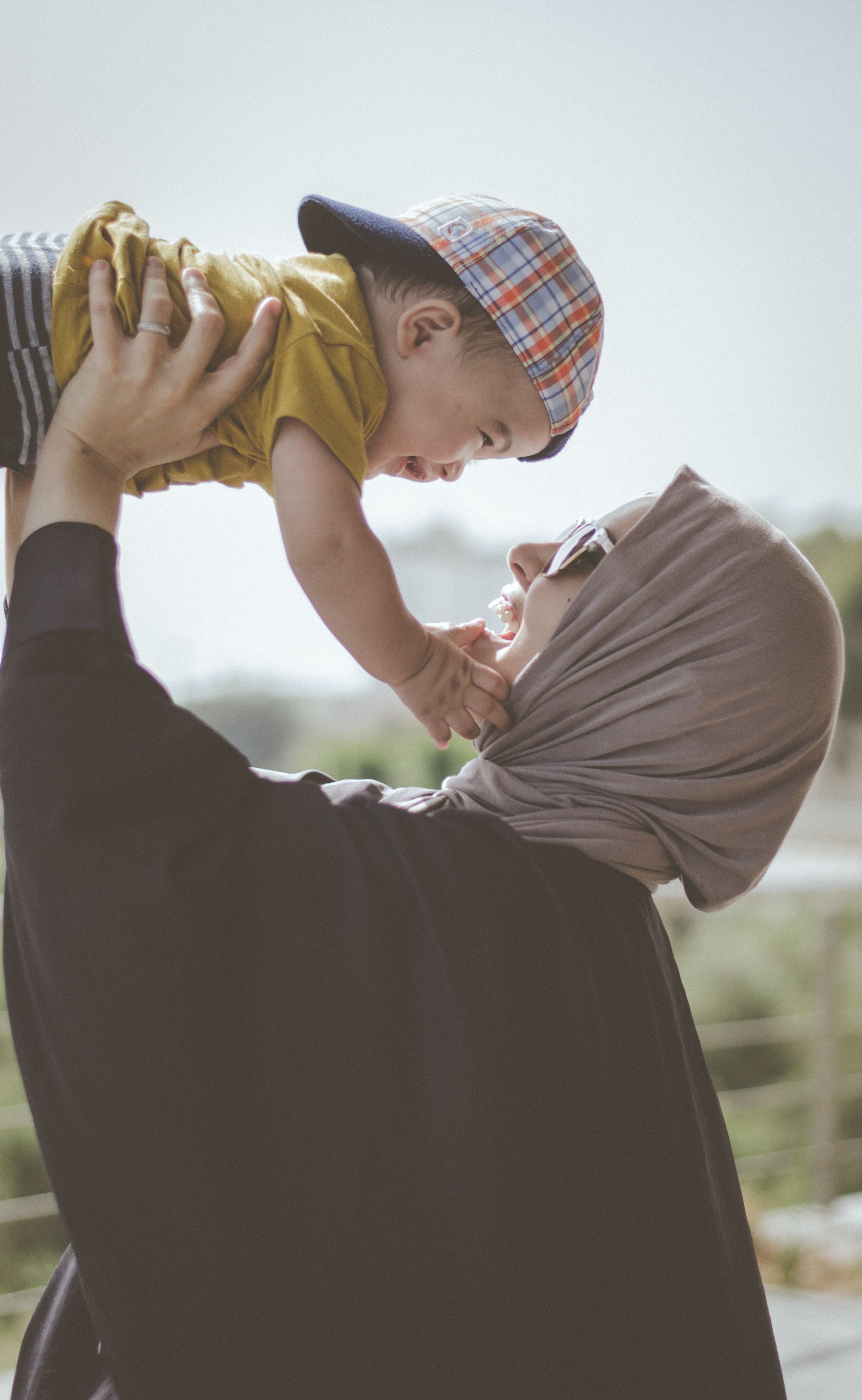 woman holding baby