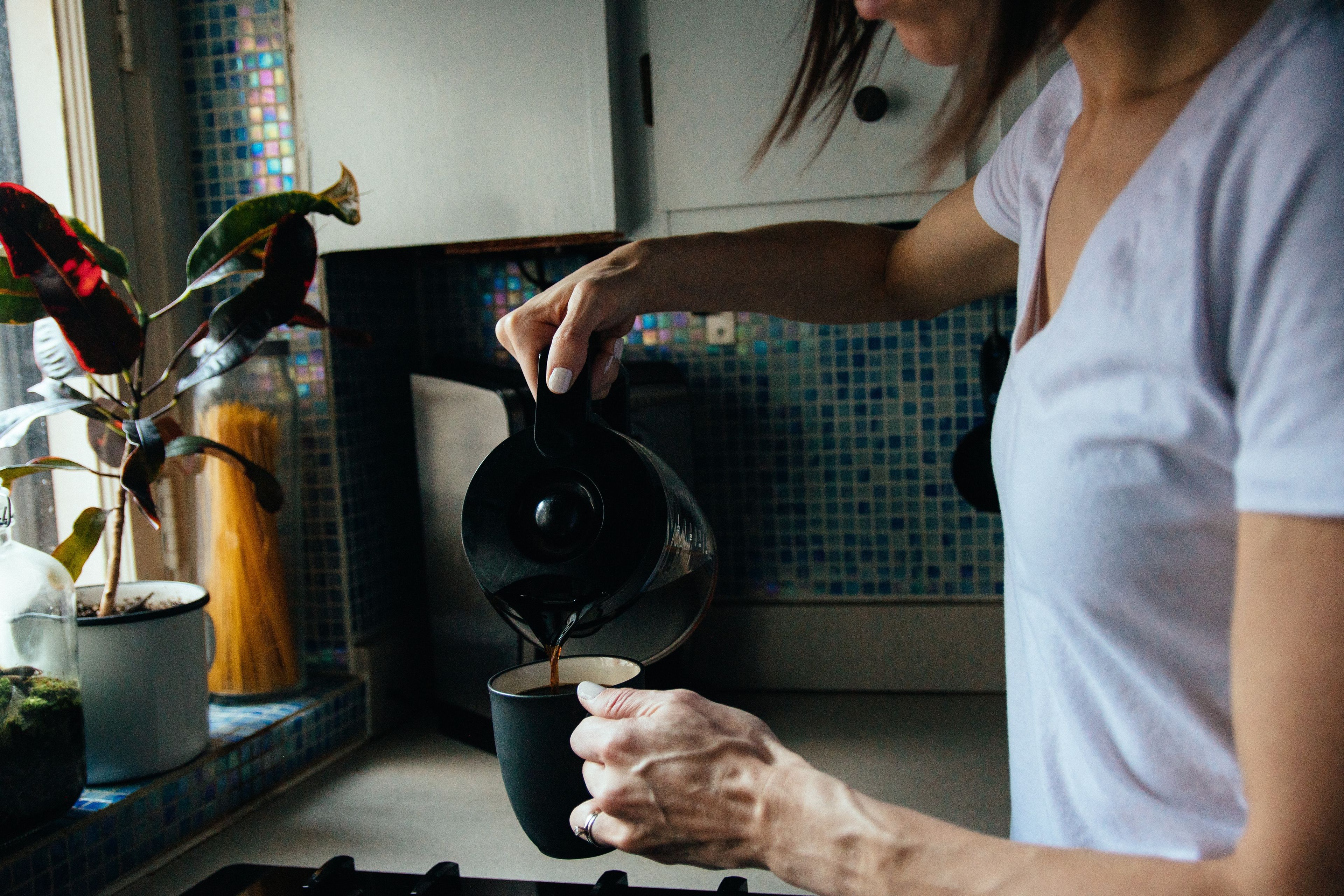 woman pouring coffee