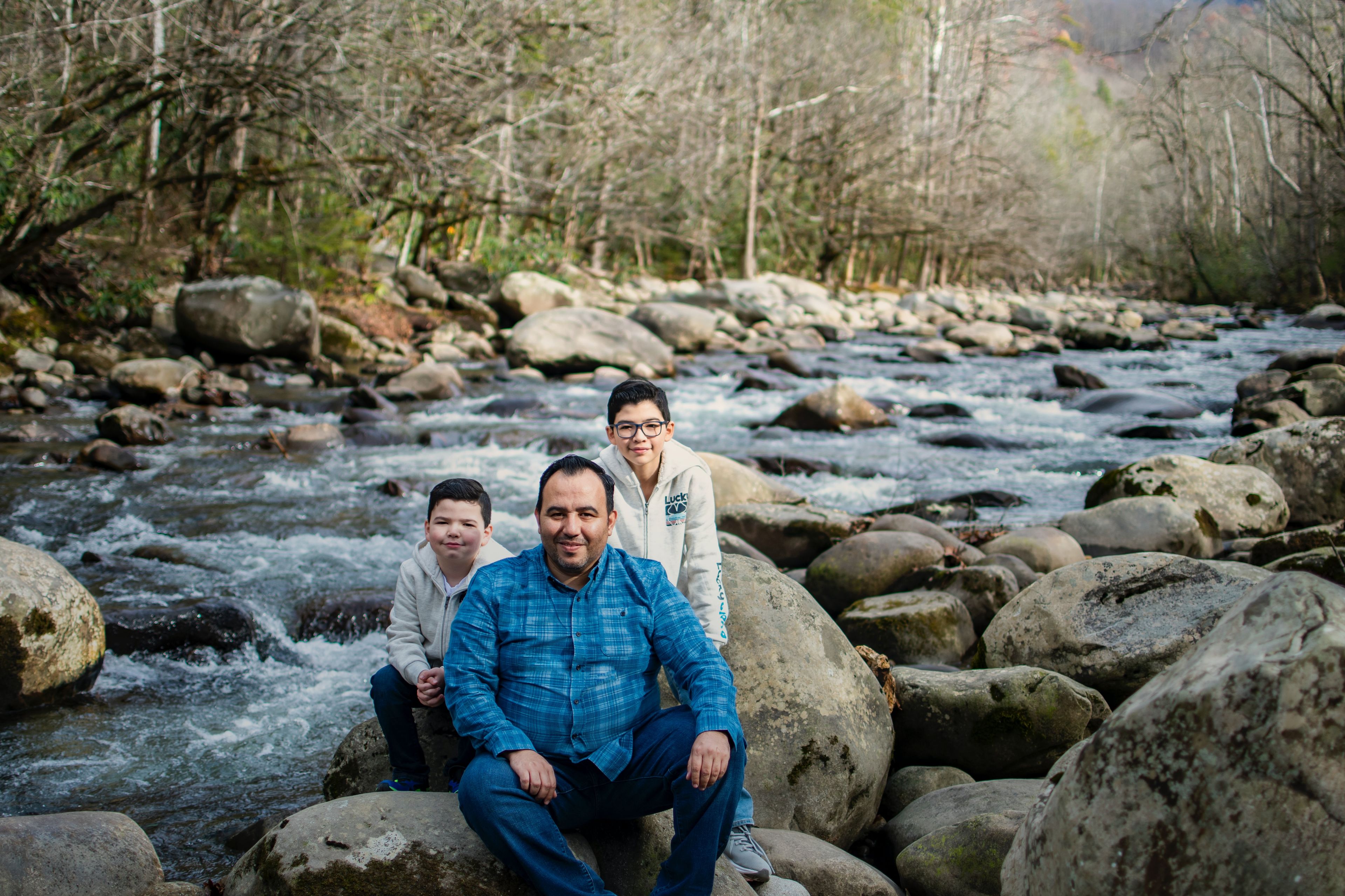 father and sons sitting together