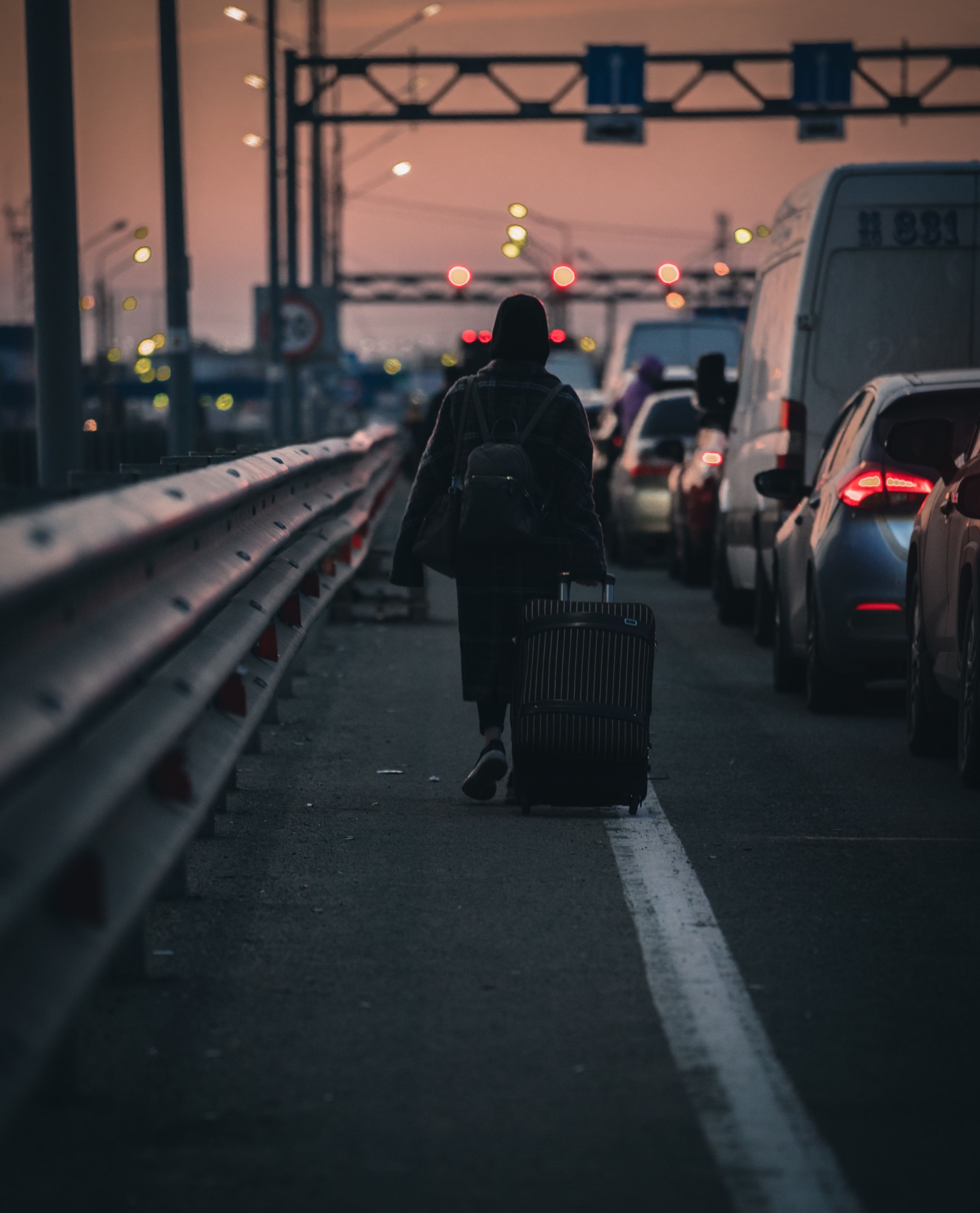 person walking on bridge 