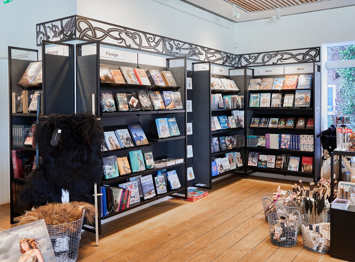 A bookshelf in the museum shop at Kongernes Jelling