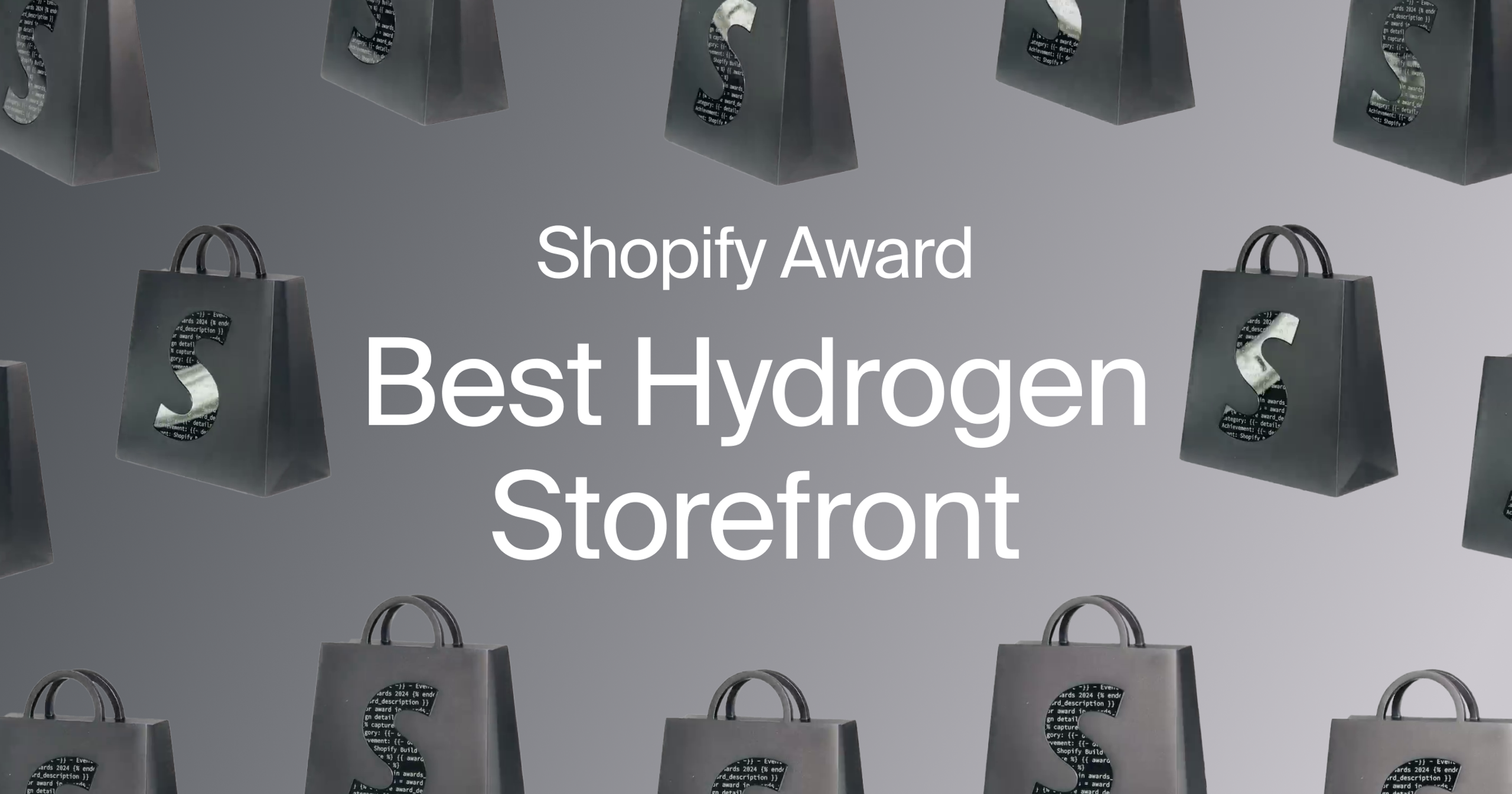 Graphic of multiple Shopify Build Award figurines in the shape of gray shopping bags with a large 'S' on them, containing code snippets inside the letter. The text 'Shopify Award Best Hydrogen Storefront' is prominently displayed in white on a gray background