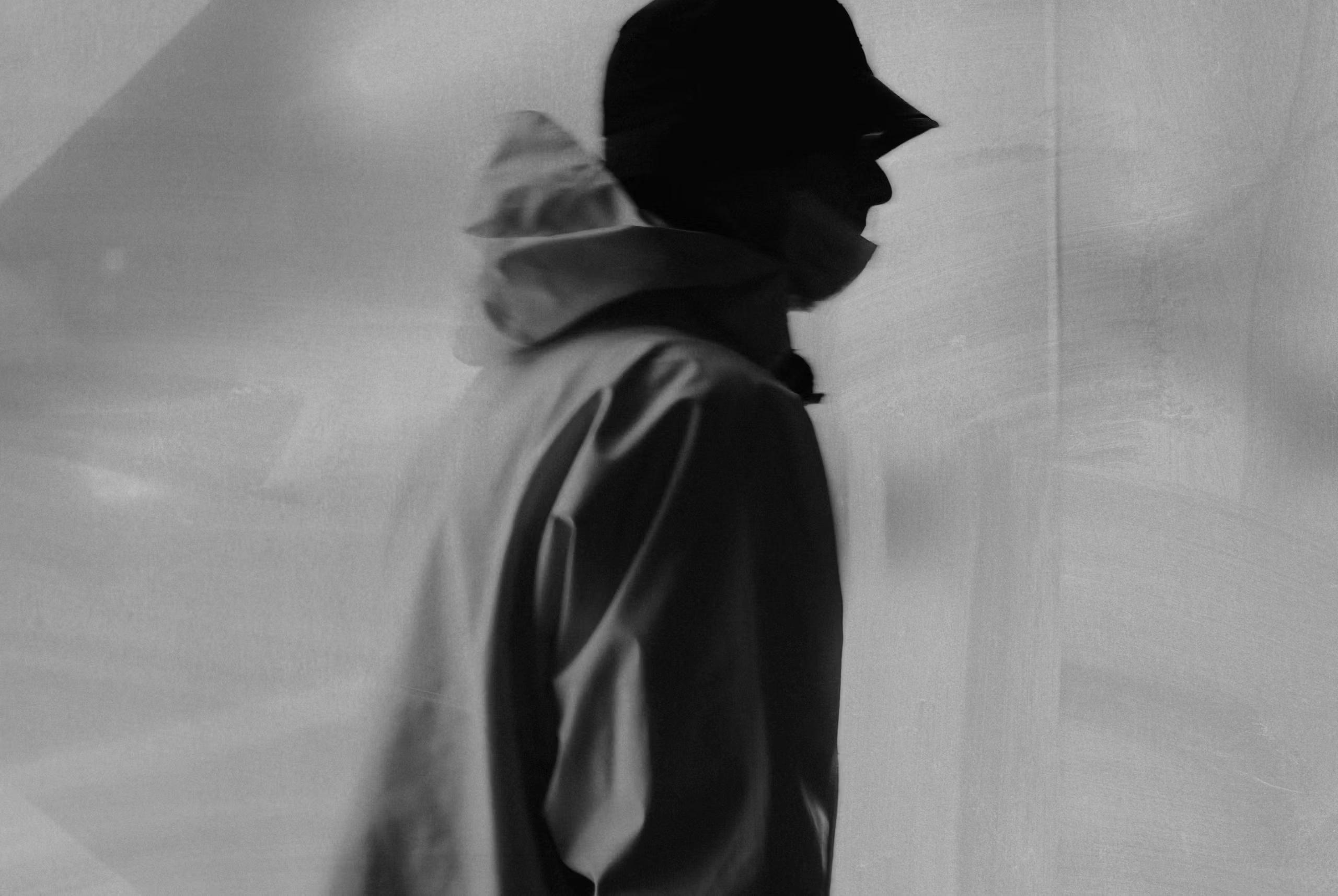 Image depicting a man in black and white