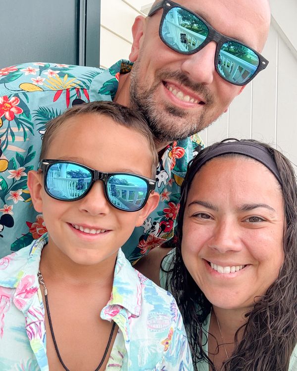 Lorie-Lyn with her husband Jeff and son at Disney, the family that inspired her photography