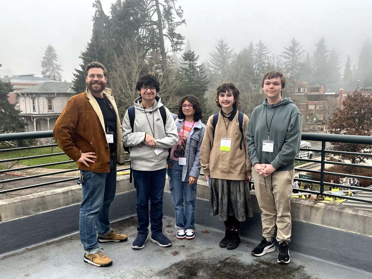 Advisor and members of the student staff of The Benson Orbit