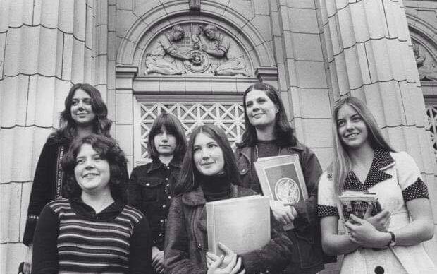 The first six girls of Benson pose on the front steps.