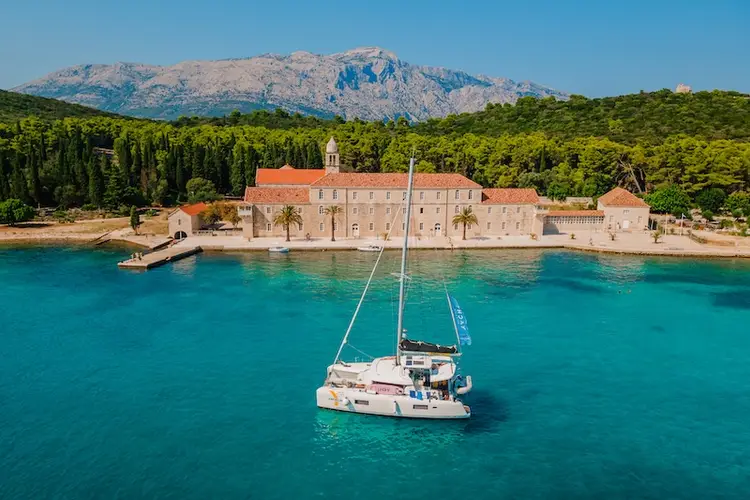 Yacht Getaways catamaran anchored in a bay in Croatia