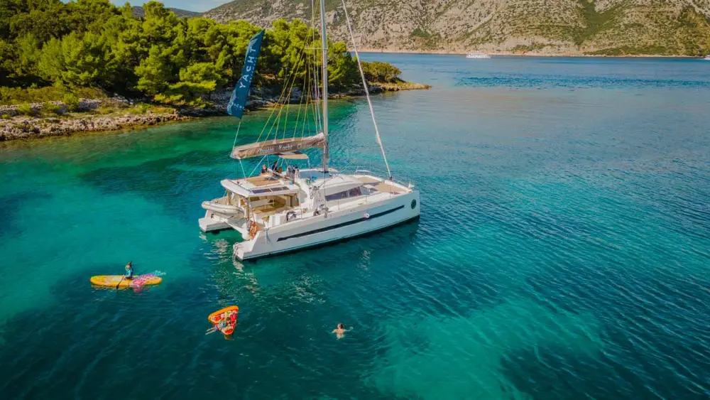 Catamaran anchored in a bay in Greece