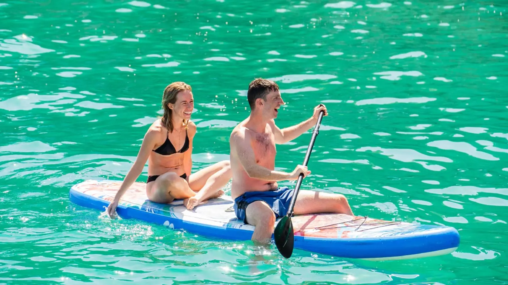 Two people on a paddleboard