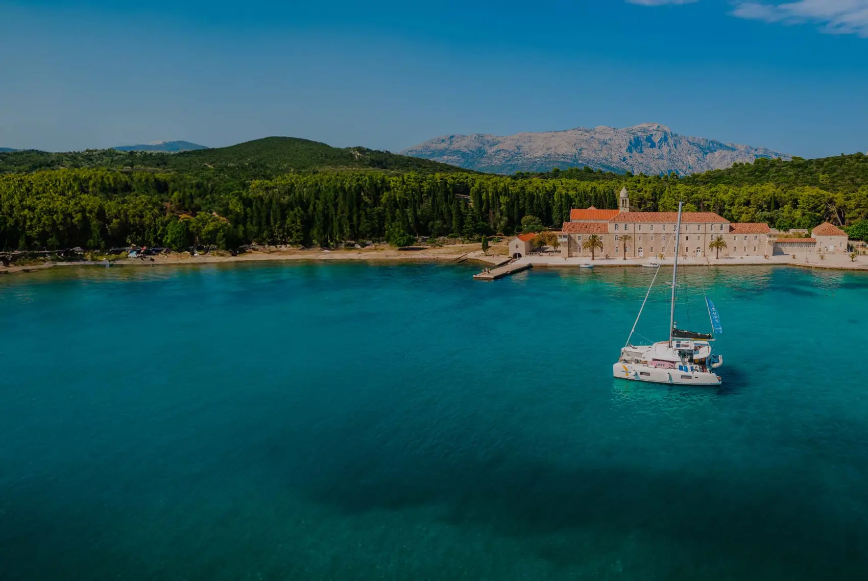 Yacht Getaways luxury catamaran sailing in the Mediterranean.