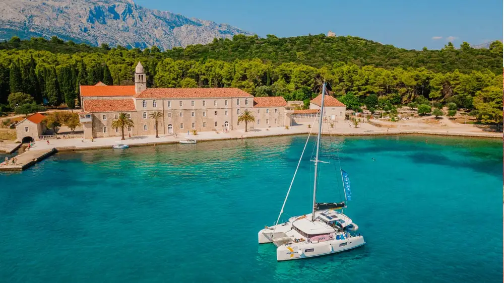 Catamaran anchored in a bay in Korcula