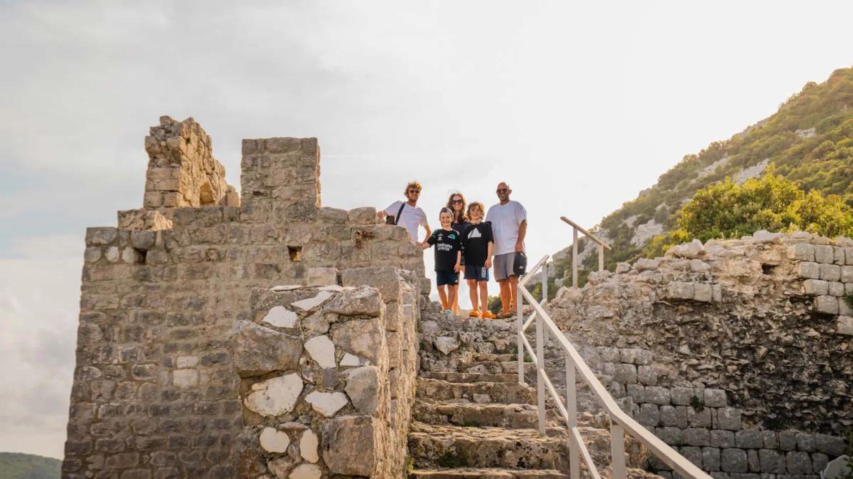 Family pose for a photo in Croatia