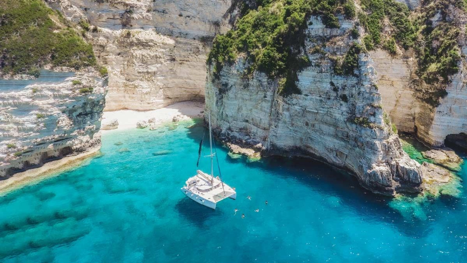 Yacht anchored in a bay with beautiful blue water