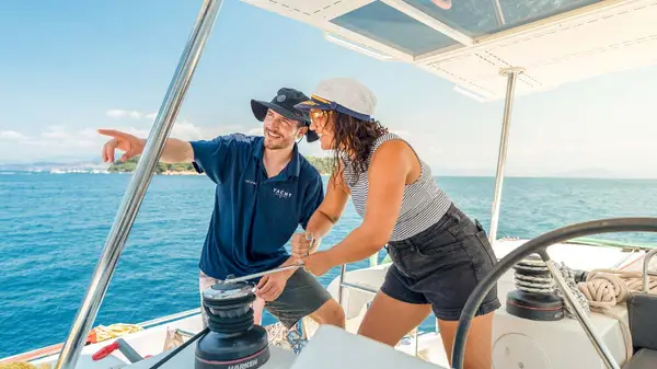 Woman learning to sail