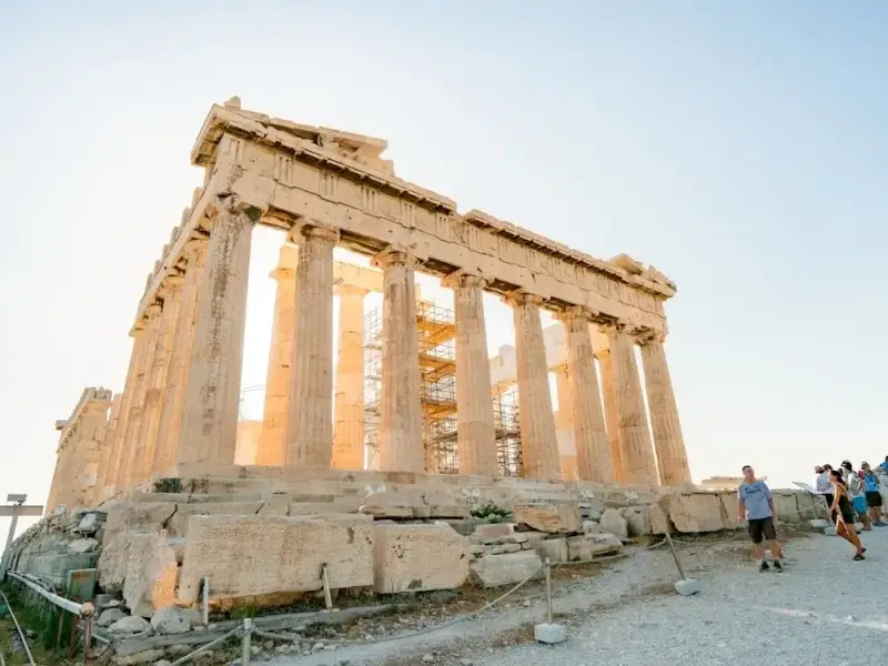 Close-up view of the Parthenon on the Acropolis in Athens, Greece, photographed in warm late-afternoon light. This image captures one of the most famous ancient landmarks in Europe and suits a travel guide about the best things to do in Athens, from visiting the Acropolis to exploring the city’s rich history before a Greek islands trip.