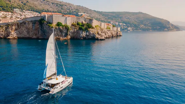 Yacht Getaways catamaran sailing towards Dubrovnik in Croatia