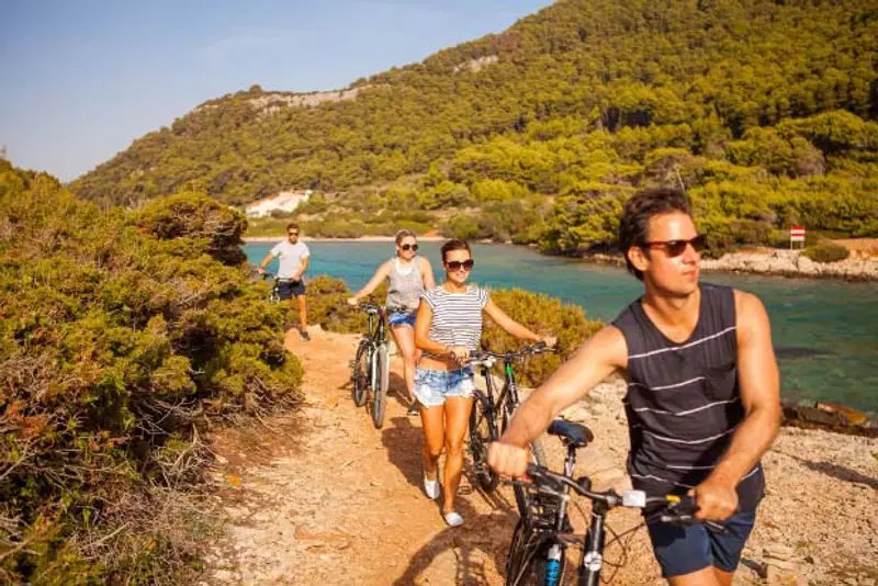 Group cycling Mljet National Park in Croatia