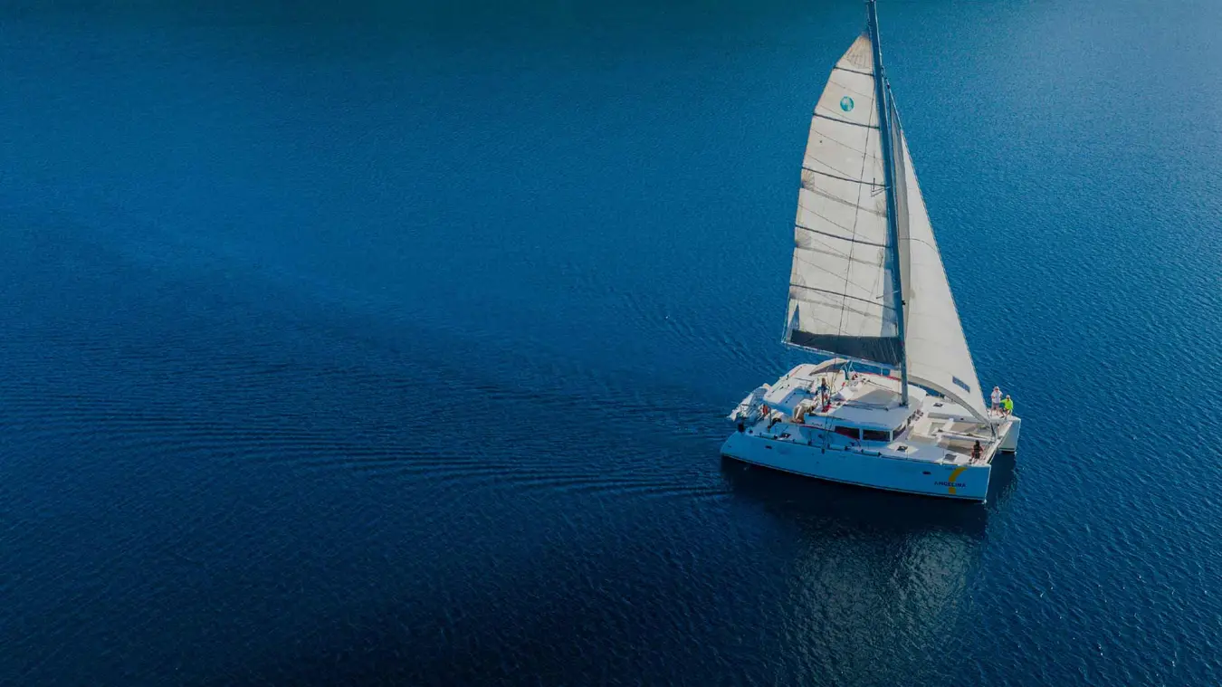 A Yacht Getaways luxury catamaran at anchor near Korcula island in Croatia.