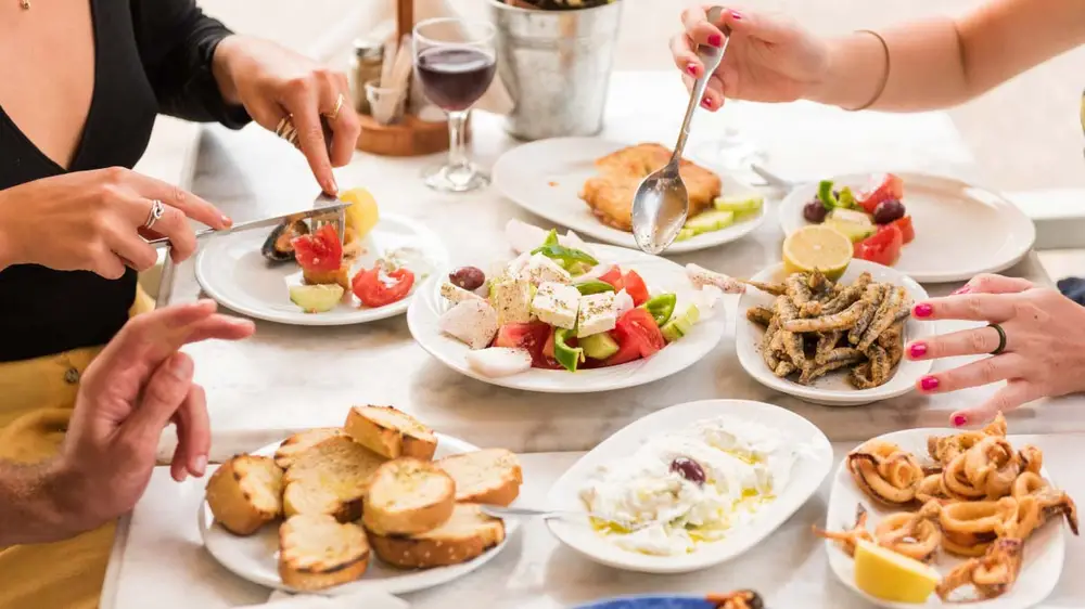 A mezzo platter of various Greek dishes.