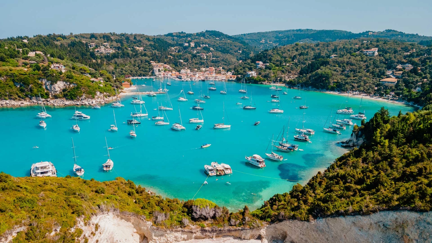 Lots of yachts anchored in a bay in Corfu