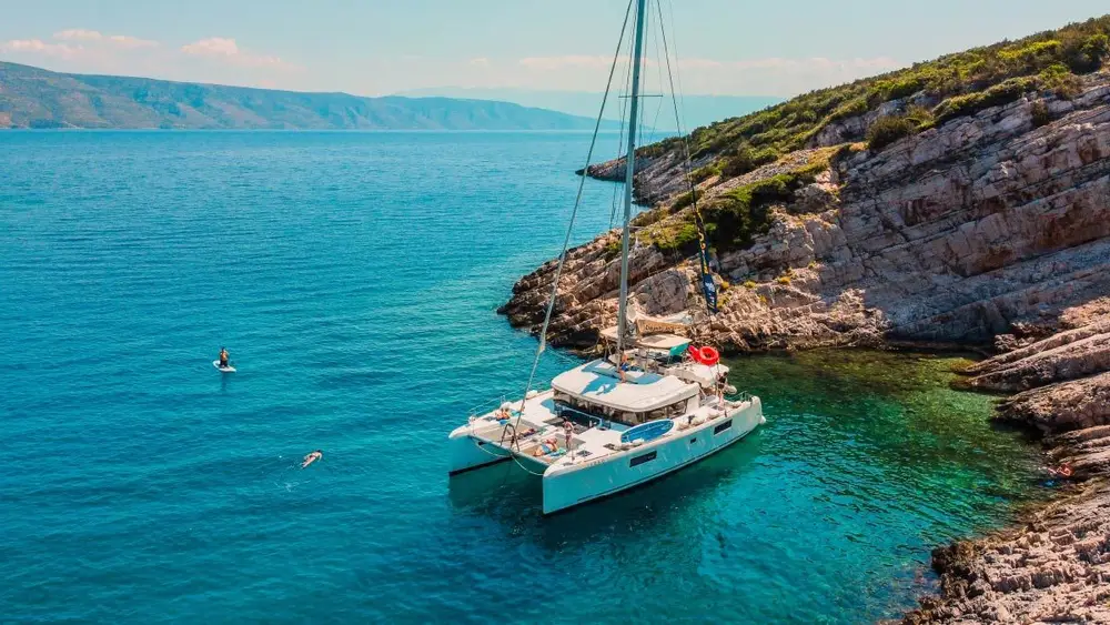 Superior Plus catamaran anchored in a beautiful bay