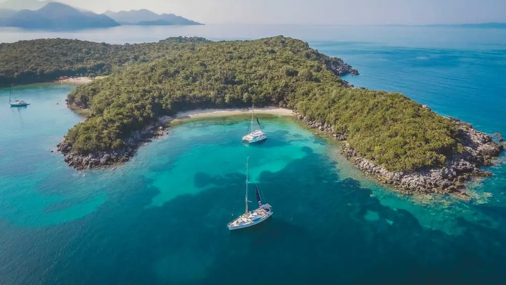 Yachts anchored in a bay in the Cyclades Islands in Greece