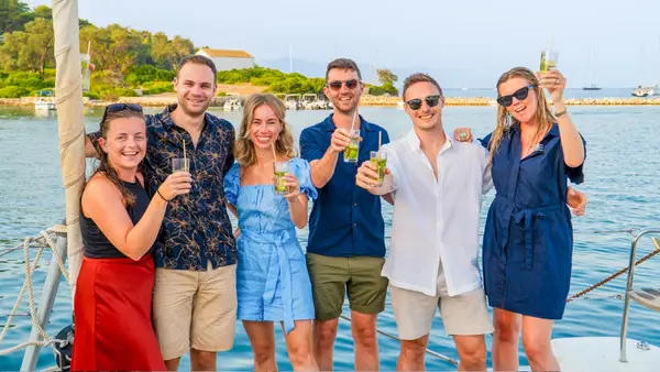 Group of people with cocktails on a yacht