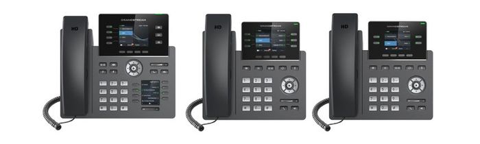 Three Grandstream GRP series desk phones, each with a colour screen, a corded handset and a full keypad.