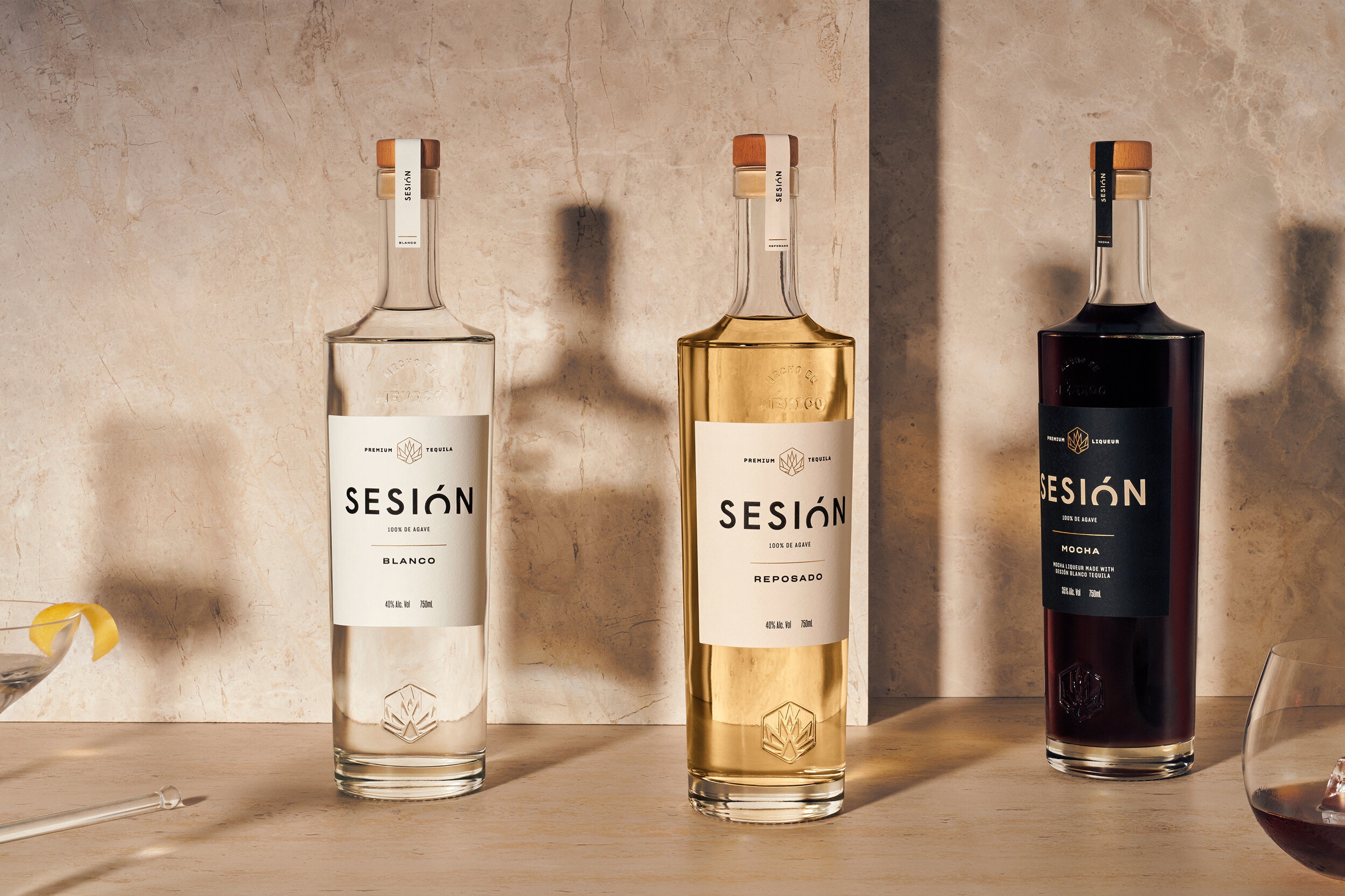 Sesión bottle lineup — Blanco, Reposado and Mocha — with spare, modern labelling