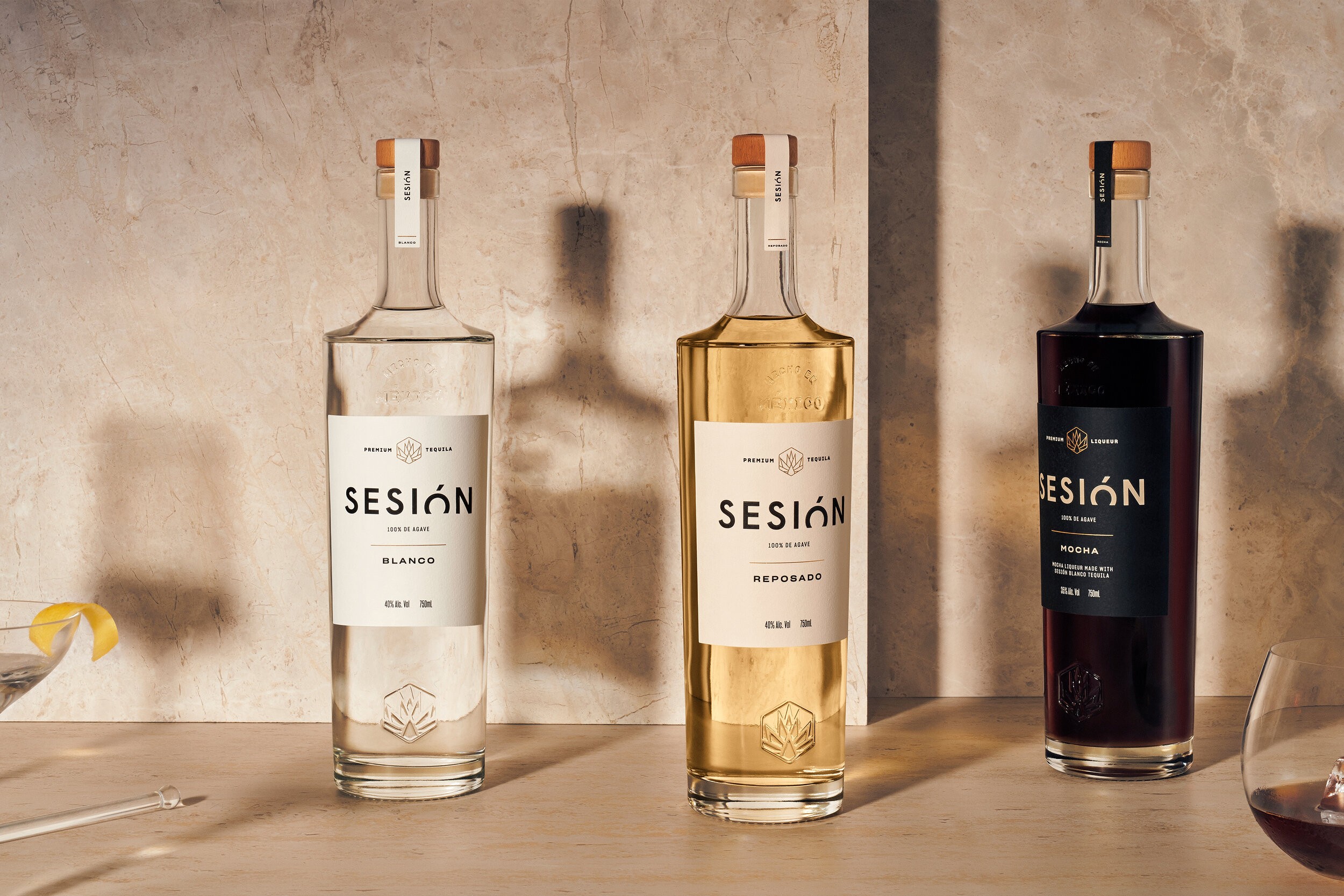 Sesión bottle lineup — Blanco, Reposado and Mocha — with spare, modern labelling