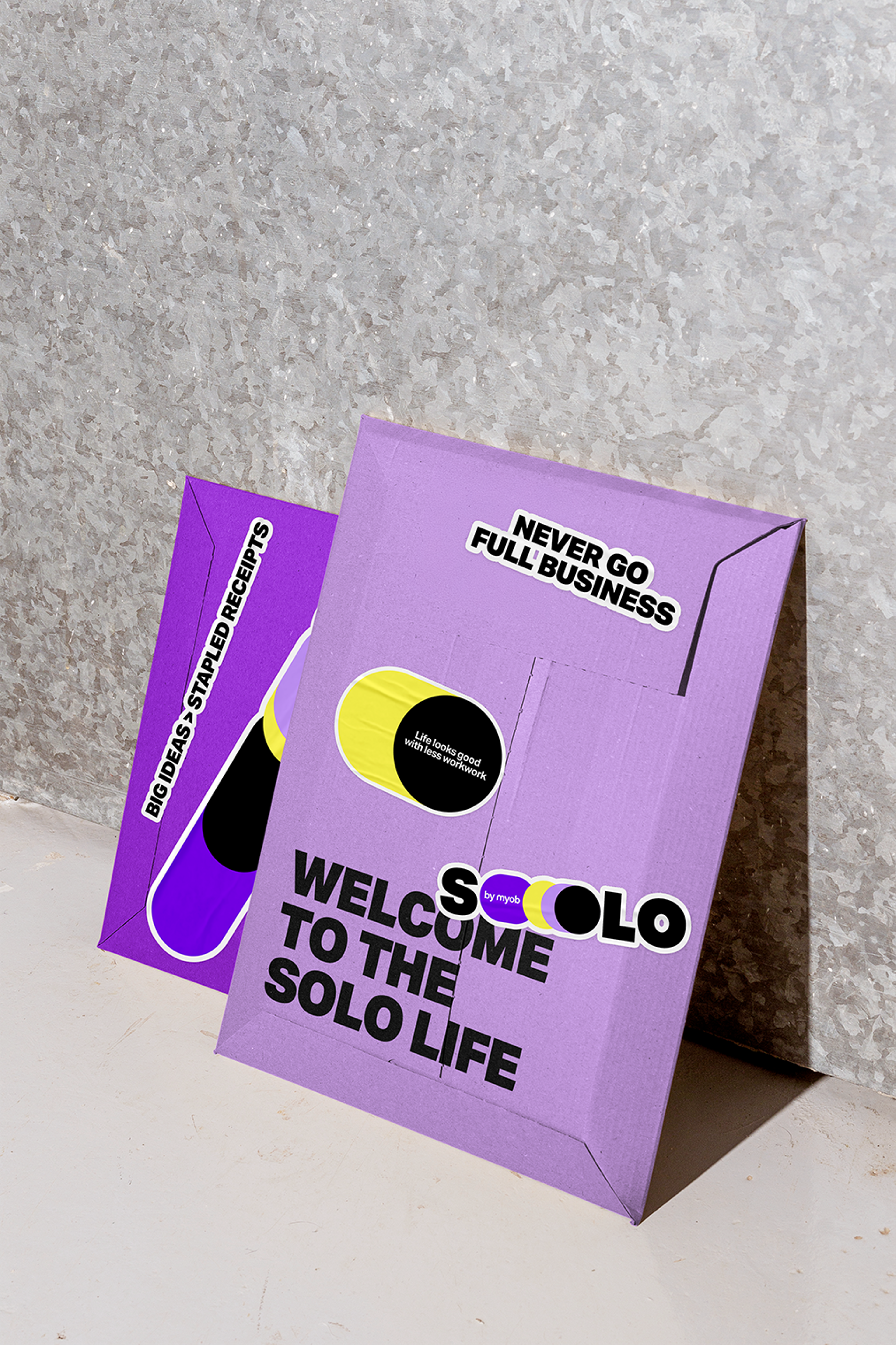 Lilac Solo by MYOB welcome mailers printed 'Welcome to the solo life' and 'Never go full business'