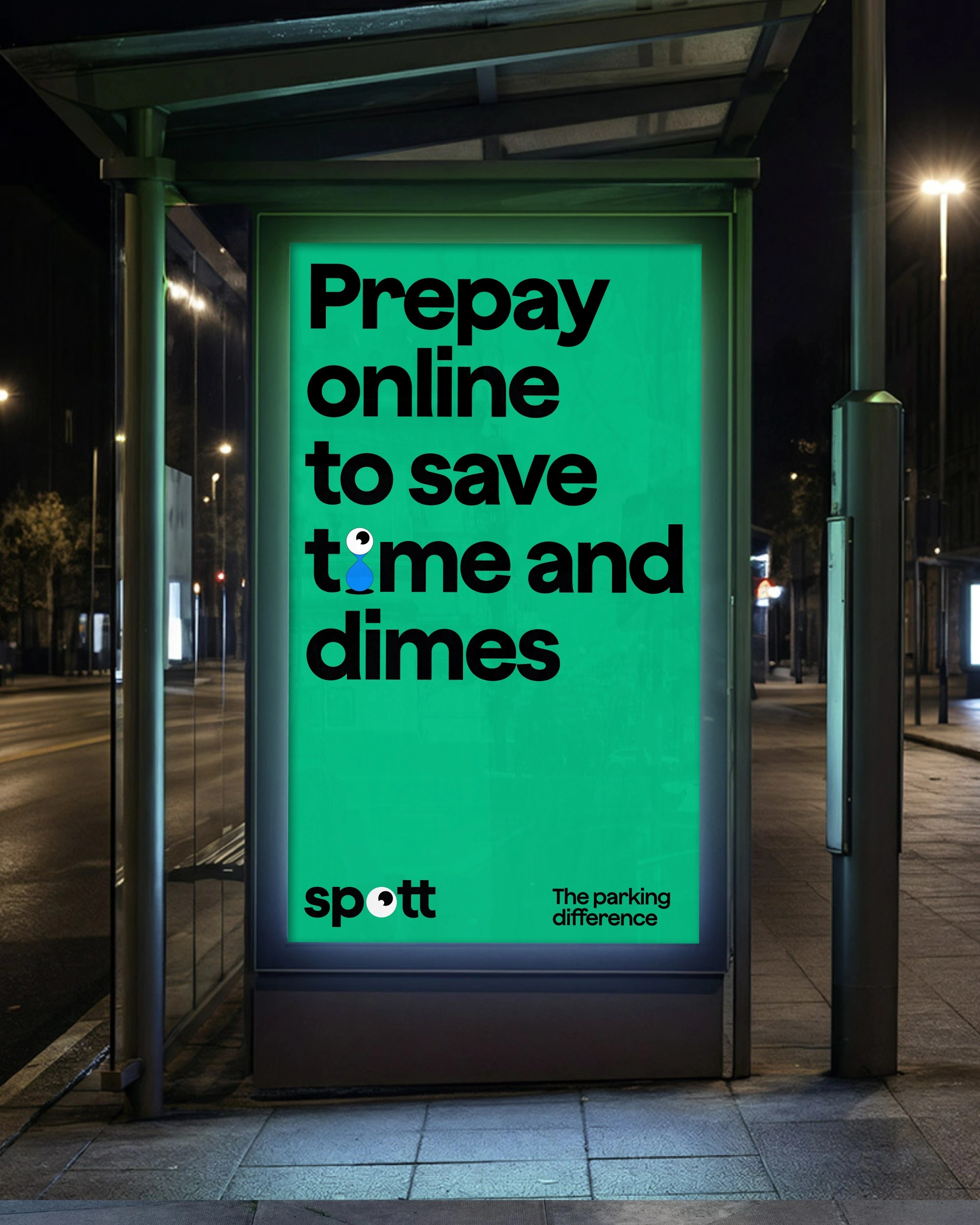 Illuminated bus shelter poster at night: 'Prepay online to save time and dimes' in black on green