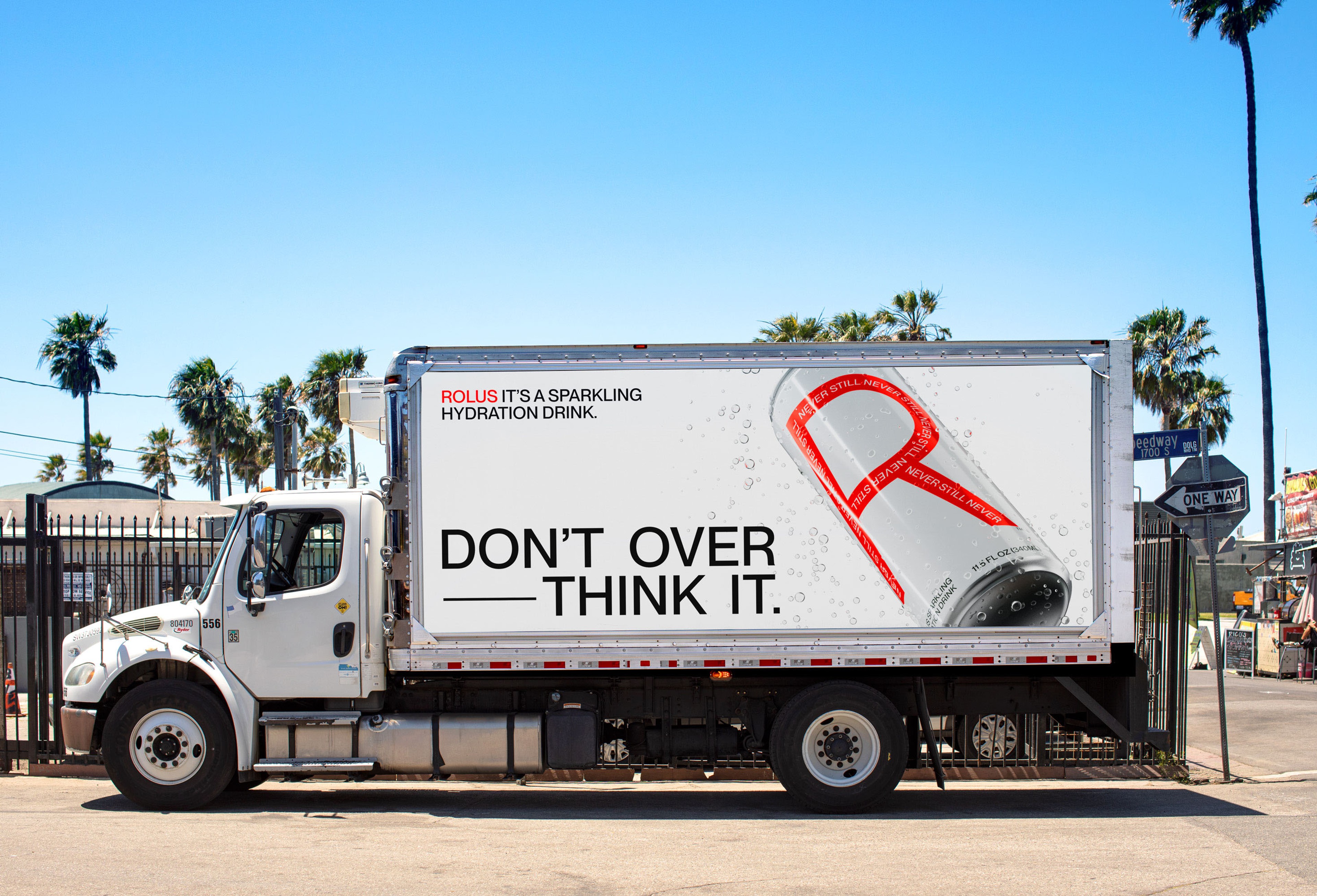 Box truck livery reading 'Don't over think it' with a tilted can forming the red R