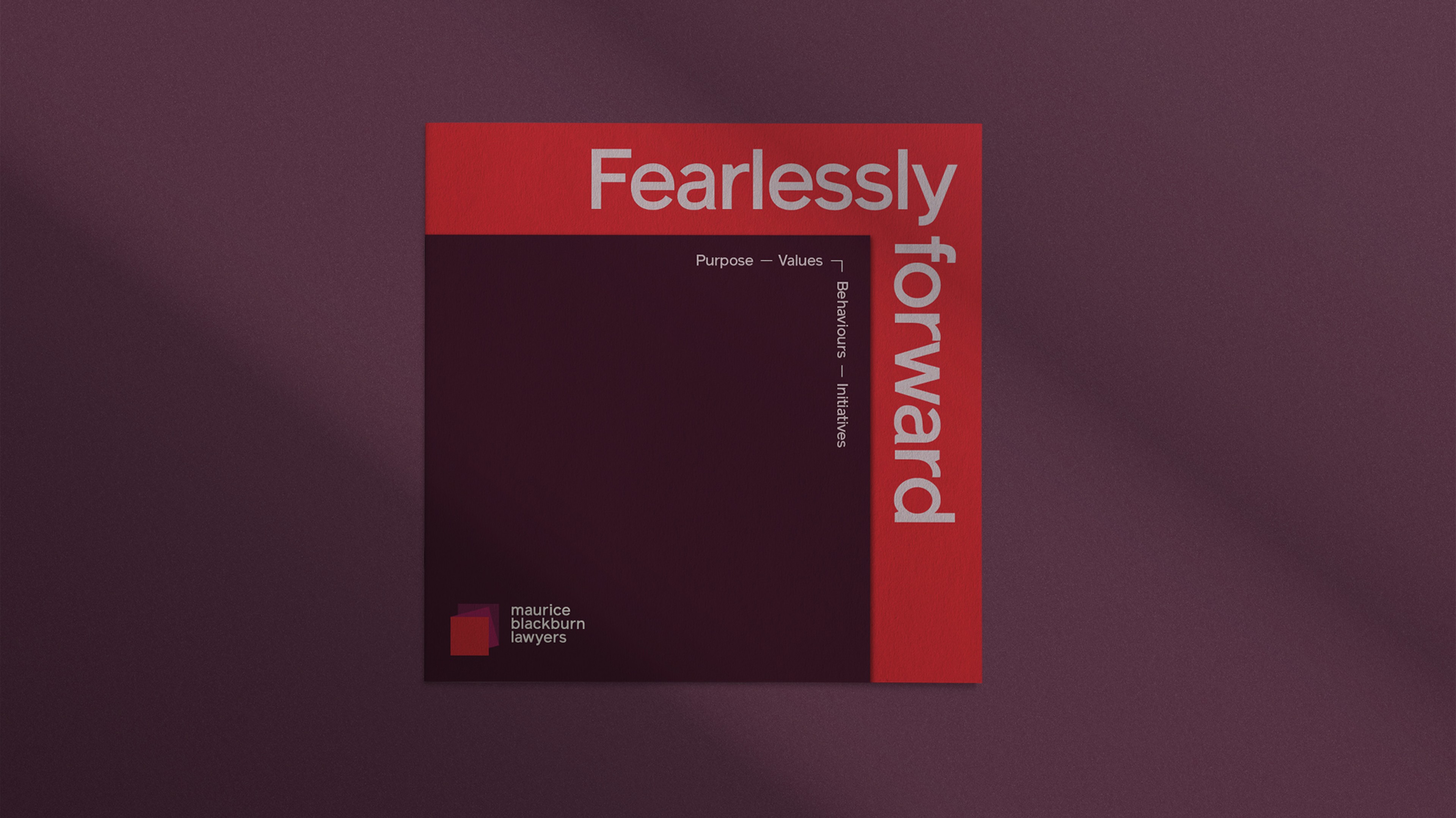 Square booklet cover in deep plum with a red spine band and 'Fearlessly forward' headline