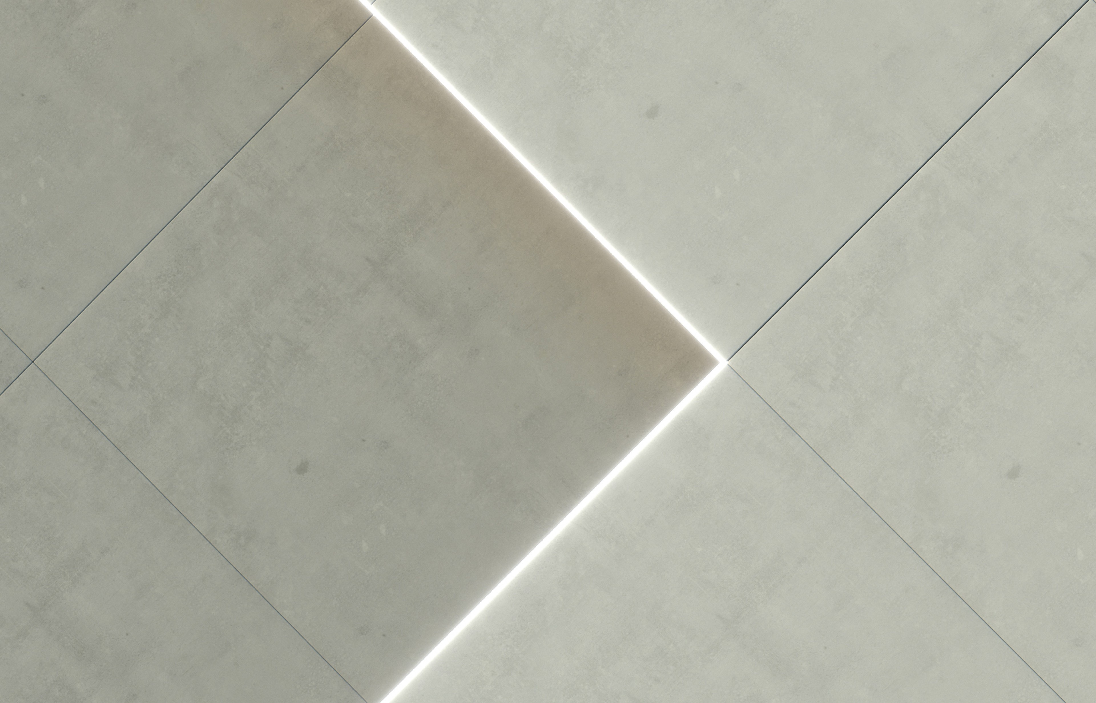 Close crop of pale wall panels traced by a lit white diagonal turning a corner