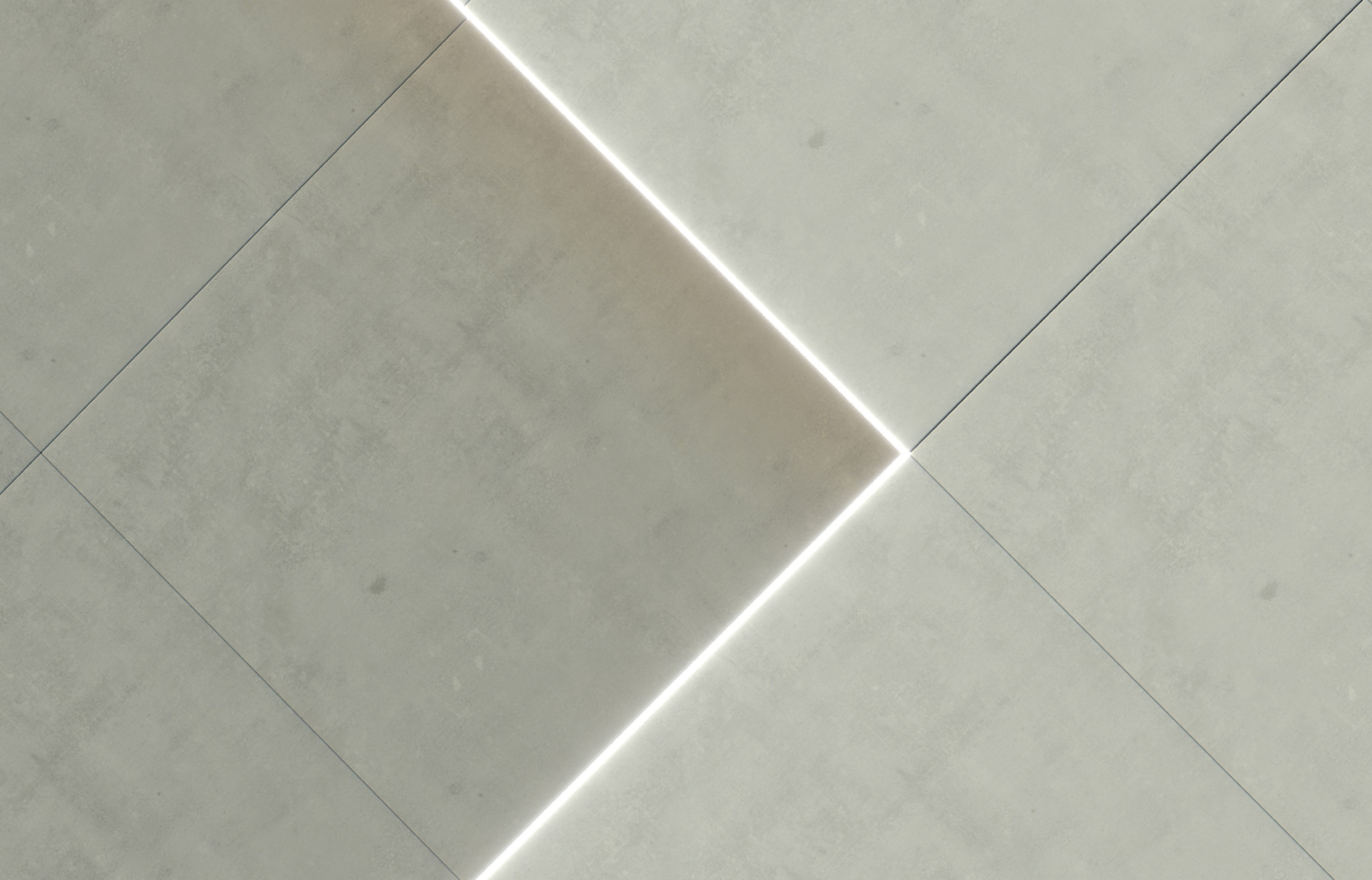 Close crop of pale wall panels traced by a lit white diagonal turning a corner