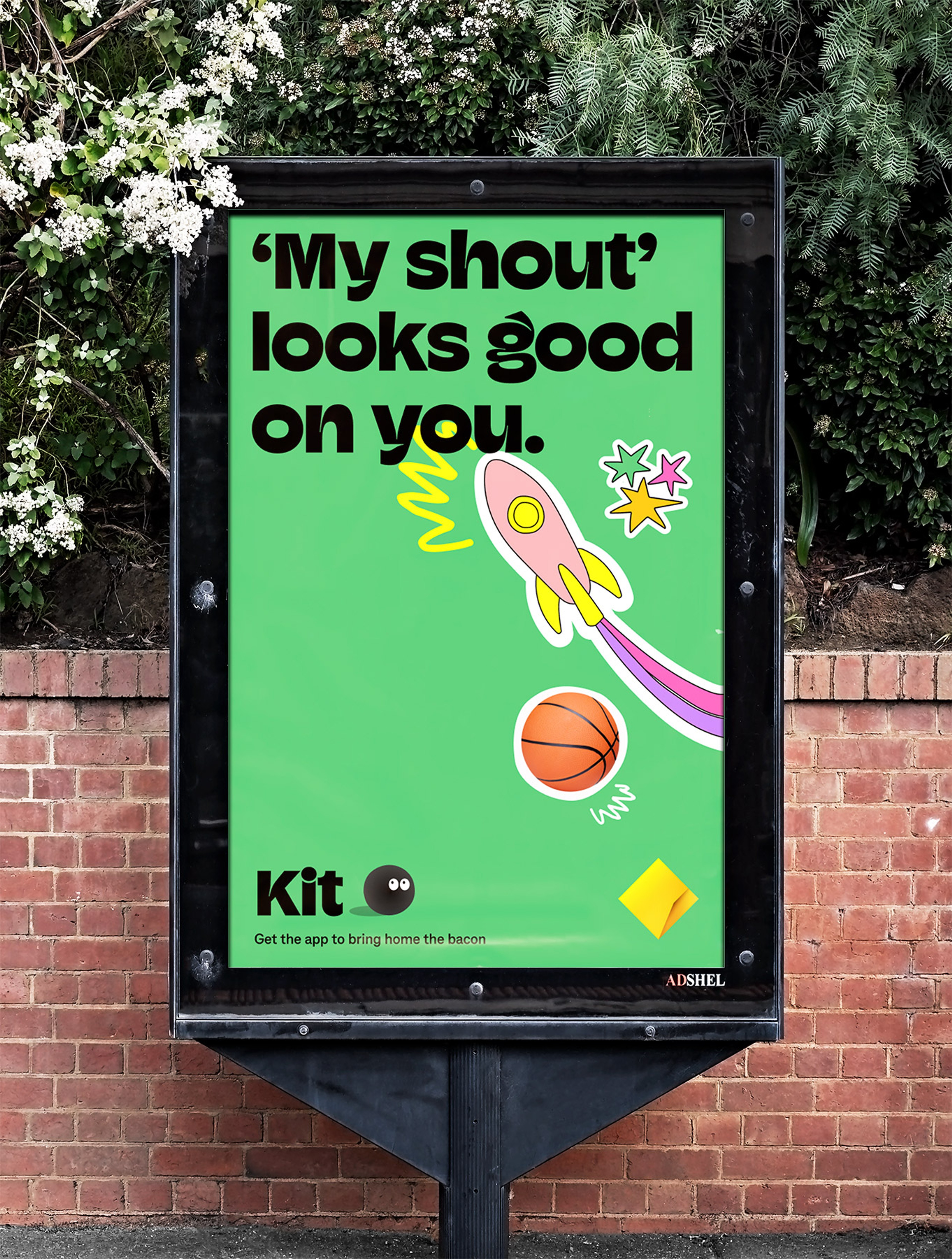 Street ad panel for Kit, heavy black type on green with sticker-style rocket, stars and squiggles