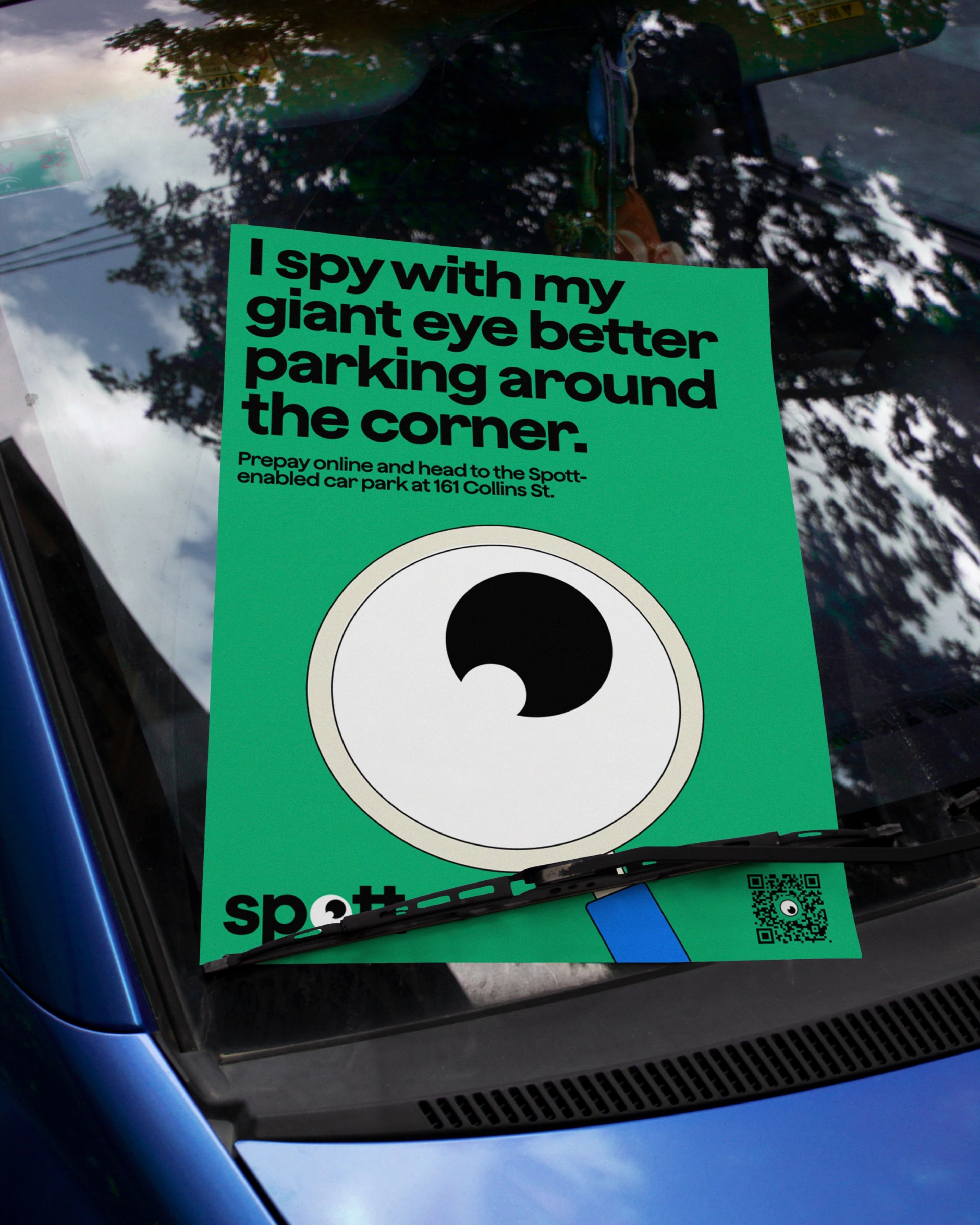 Windscreen flyer in green with a giant cartoon eye and an 'I spy with my giant eye' parking headline
