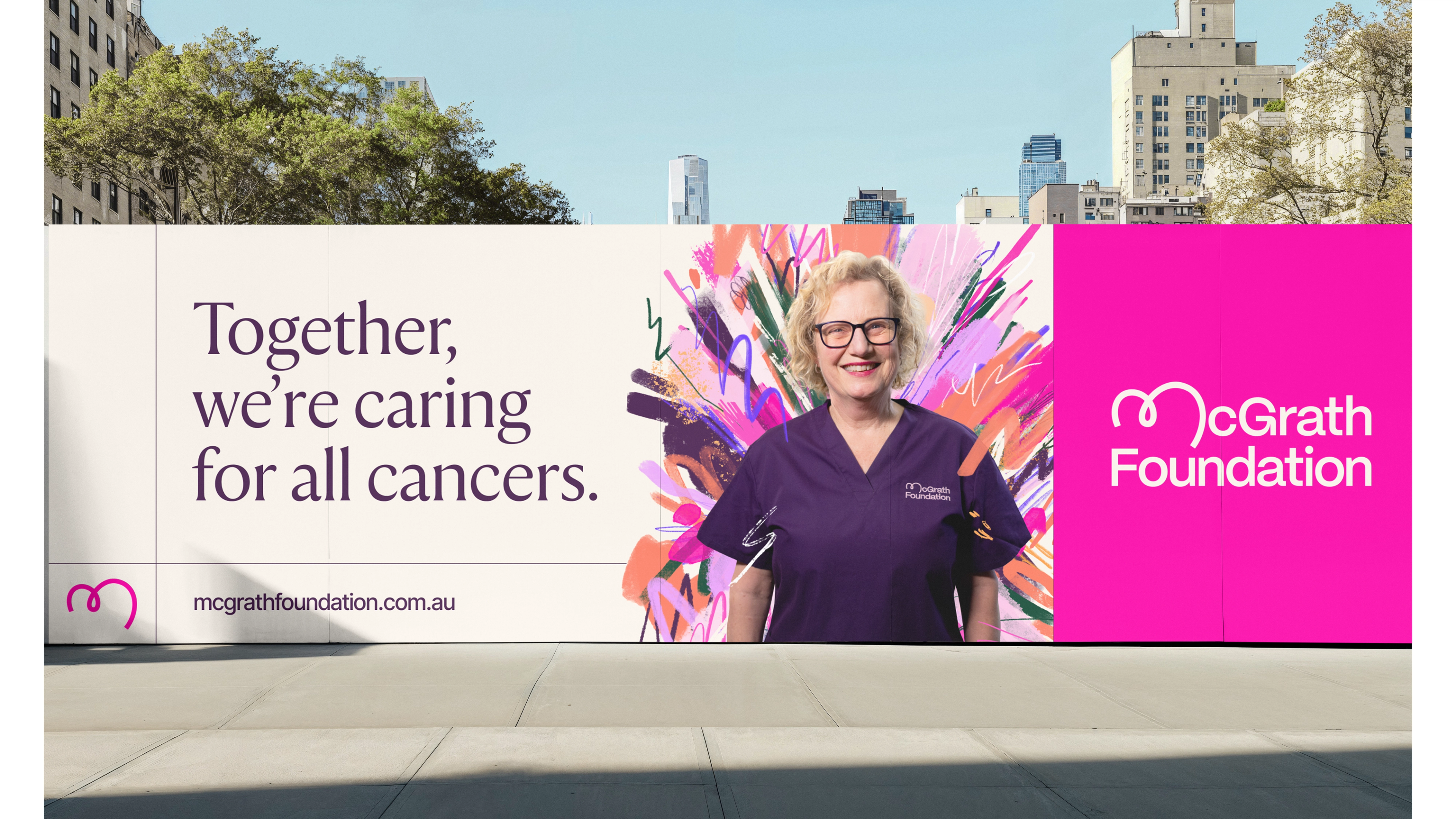 Outdoor hoarding pairing a bold serif headline with the refreshed magenta Foundation wordmark panel