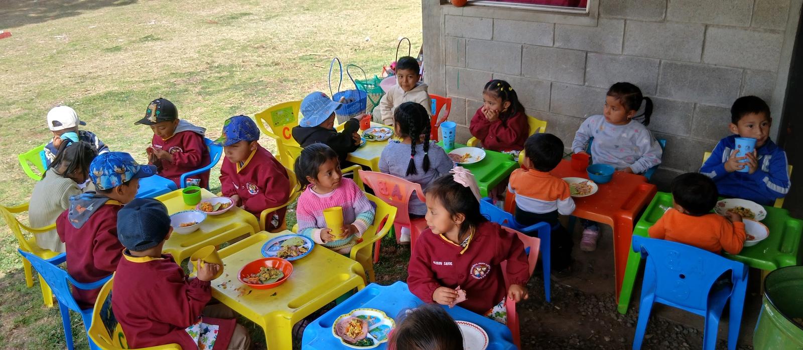 Children eating a nutritious snack in the classroom