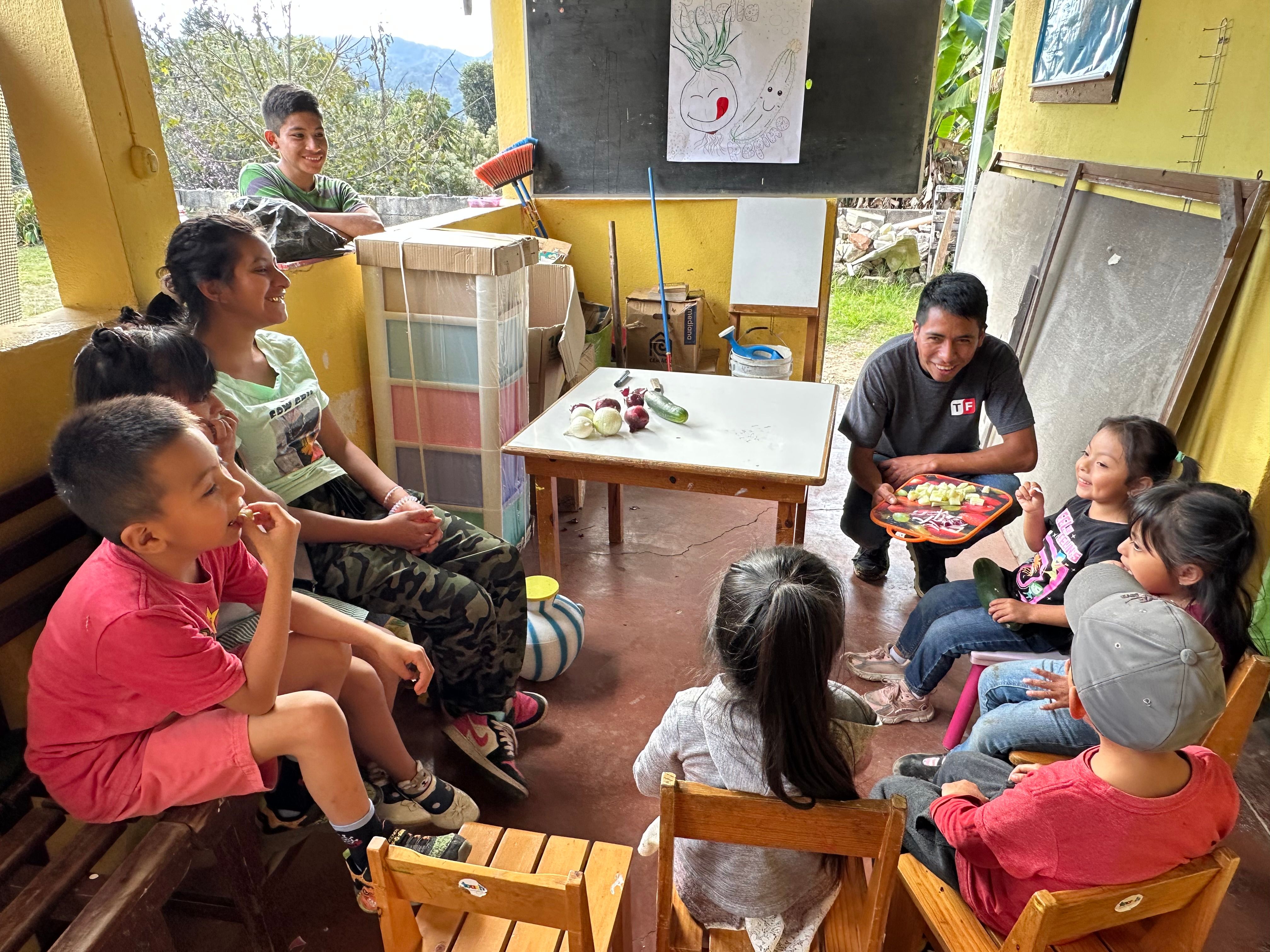 Children eating a nutritious snack in the classroom