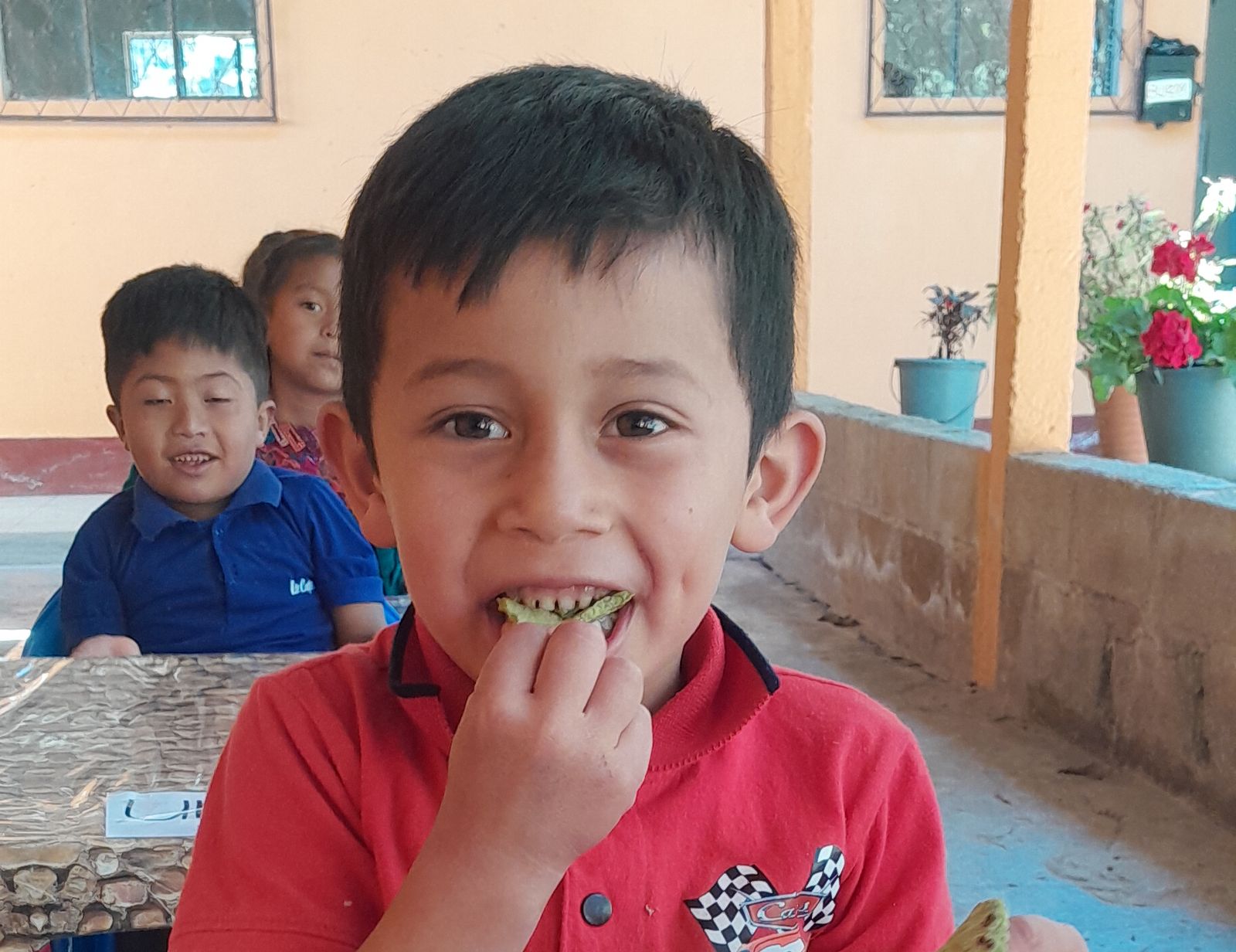 Children eating a nutritious snack in the classroom