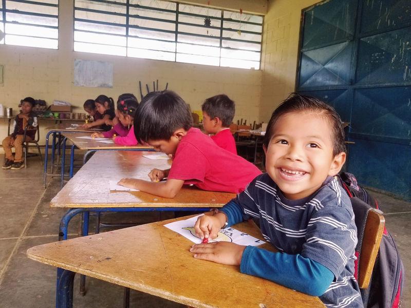Happy children in a Let's Be Ready preschool classroom