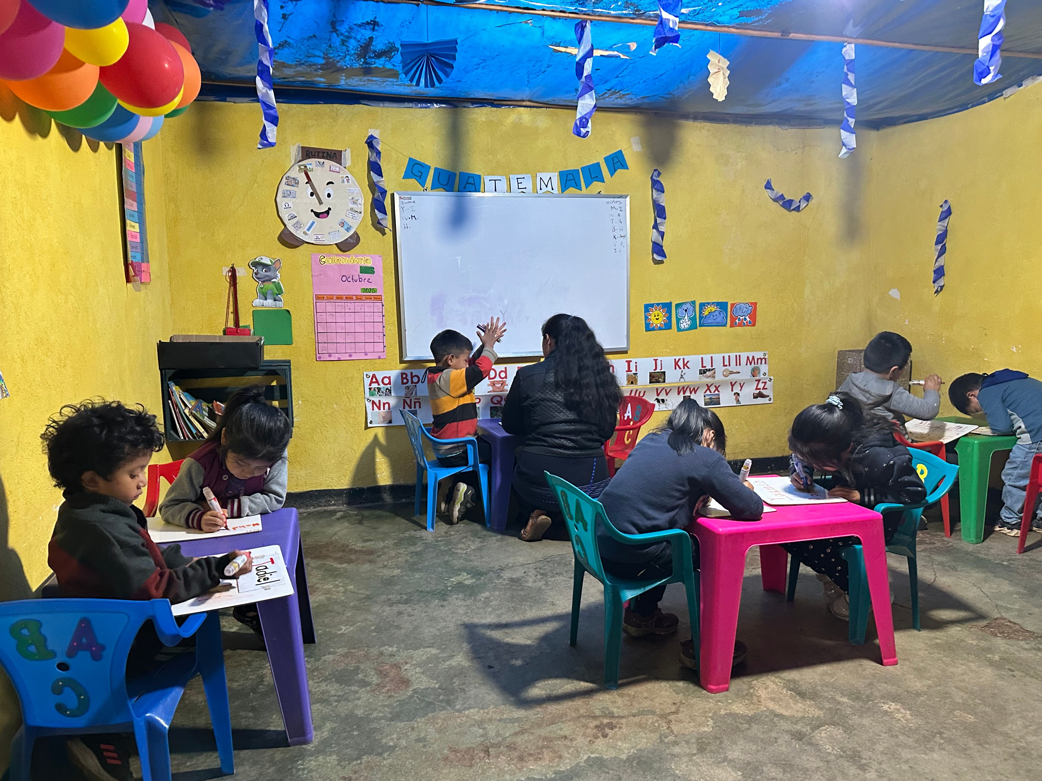 A young facilitator being trained to teach preschool