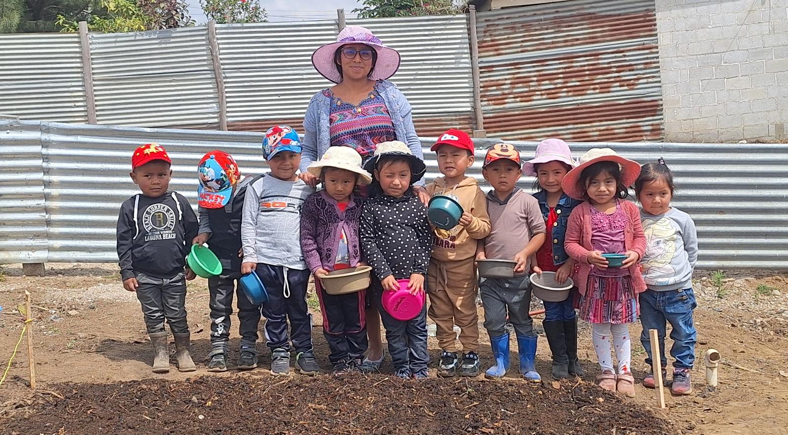 Children tending a classroom garden