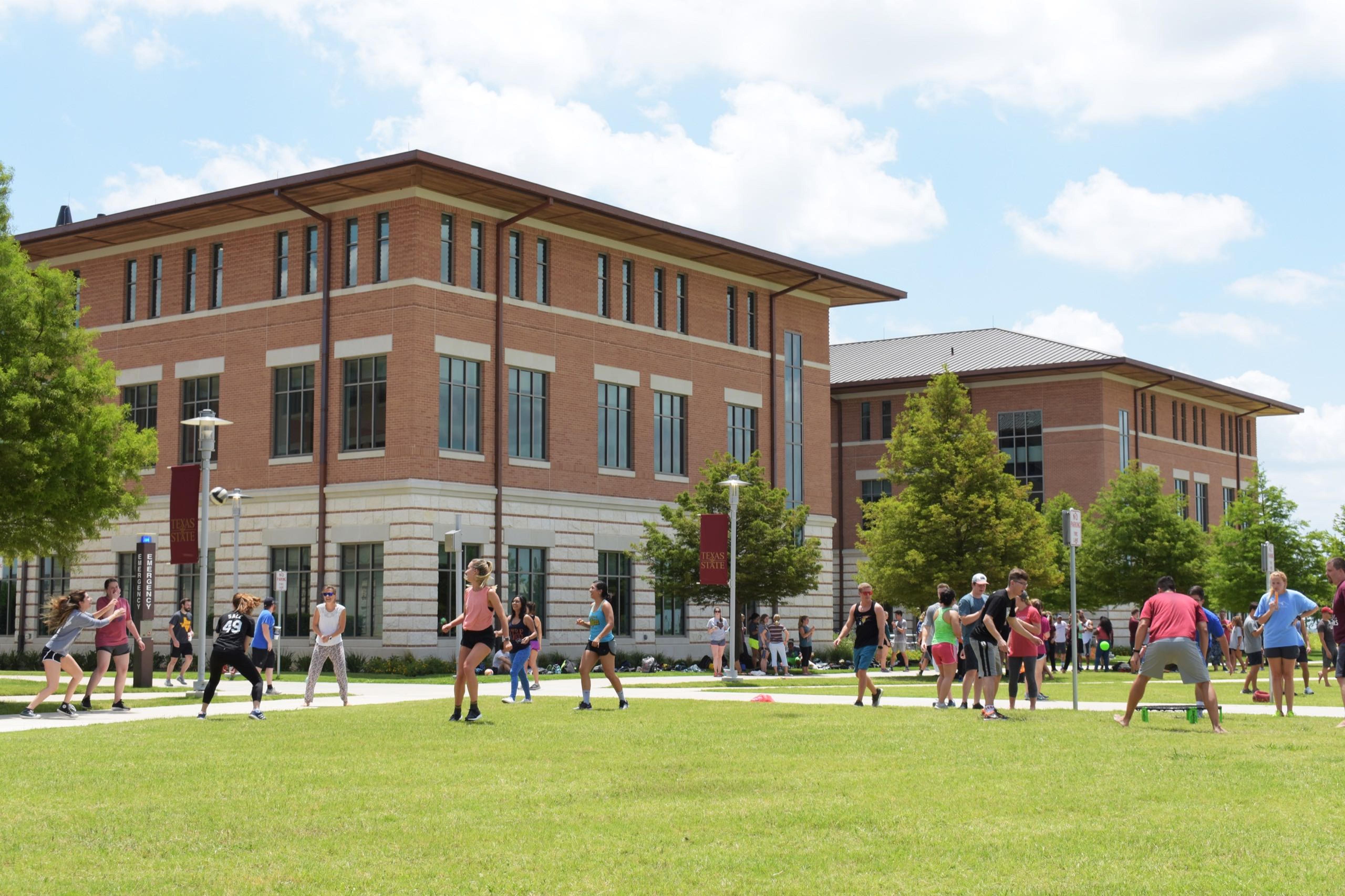 students outside of campus buildings