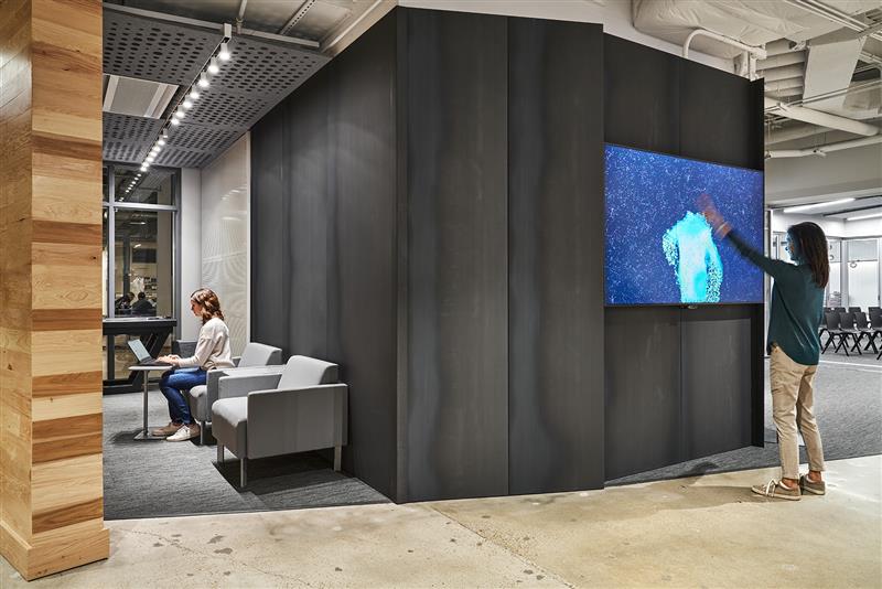 building interior with someone using an interactive touch screen