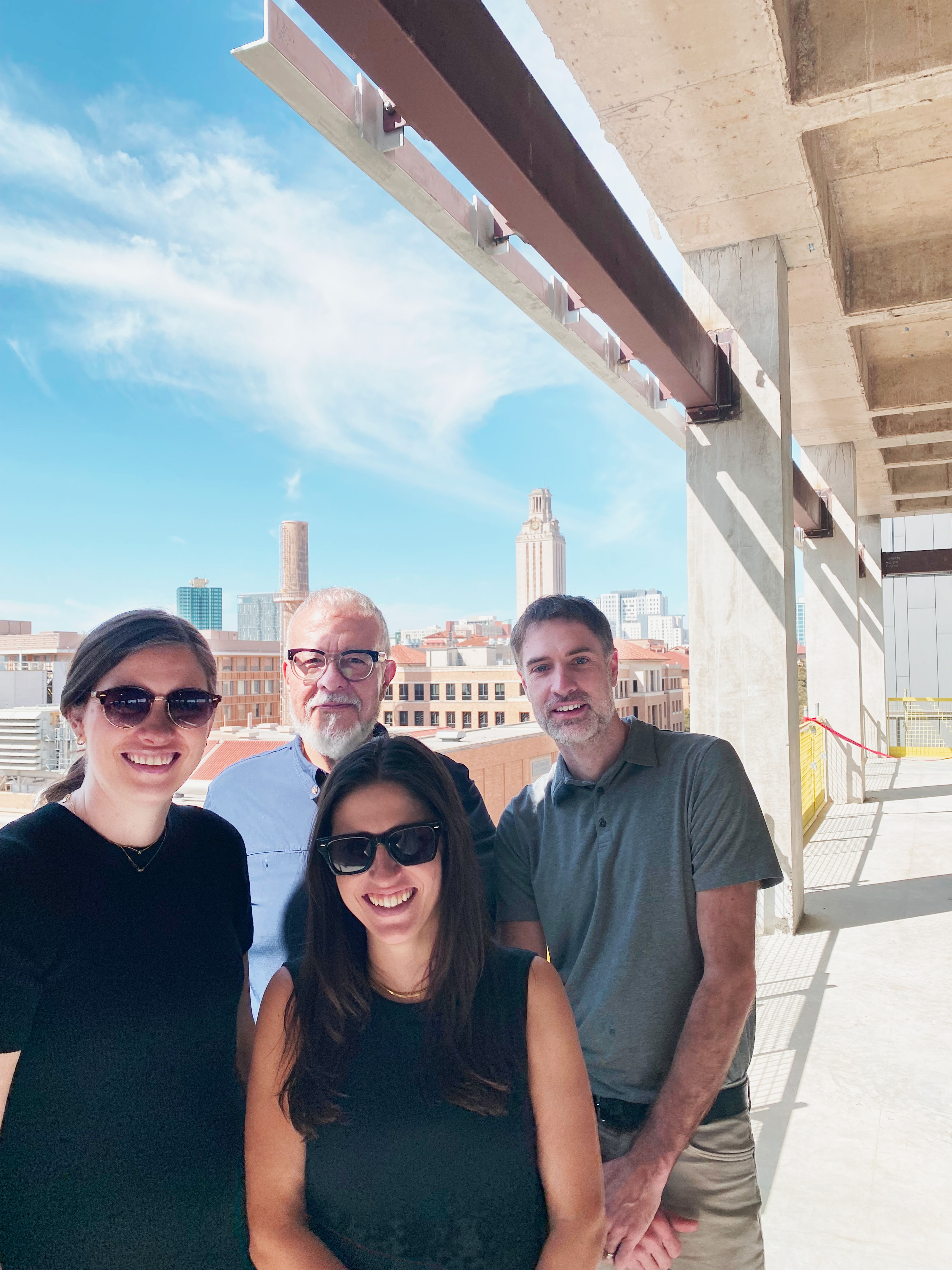 group standing in sunshine