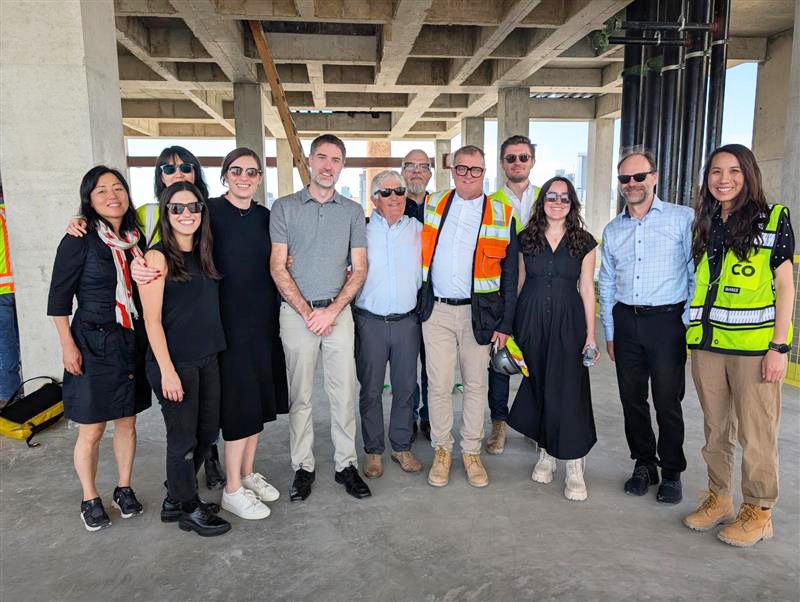 group of people at covered construction site